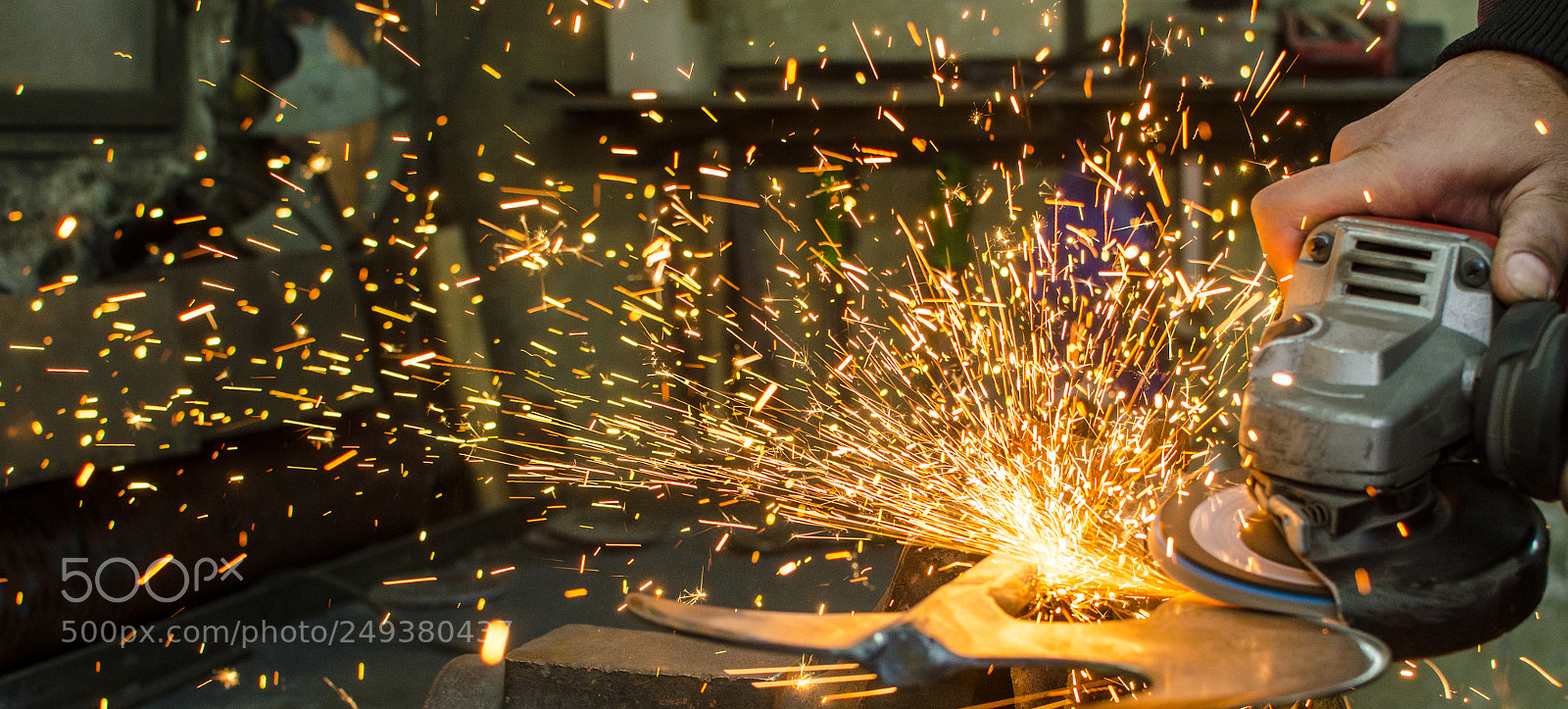 Nikon D7000 sample photo. Industrial grinder and sparks photography