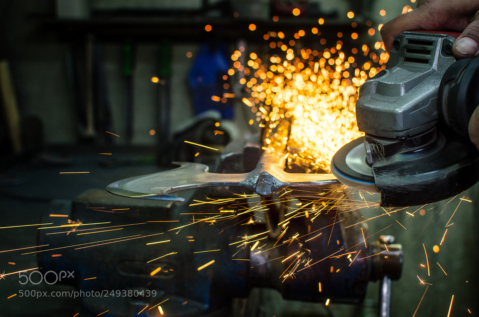 Nikon D7000 sample photo. Industrial grinder and sparks photography