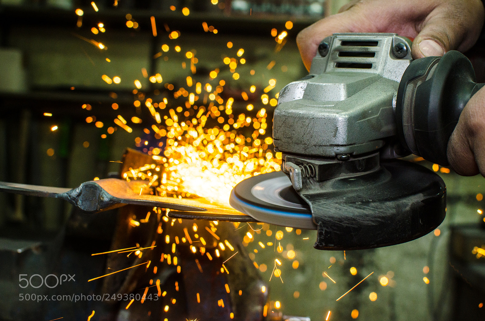 Nikon D7000 sample photo. Industrial grinder and sparks photography