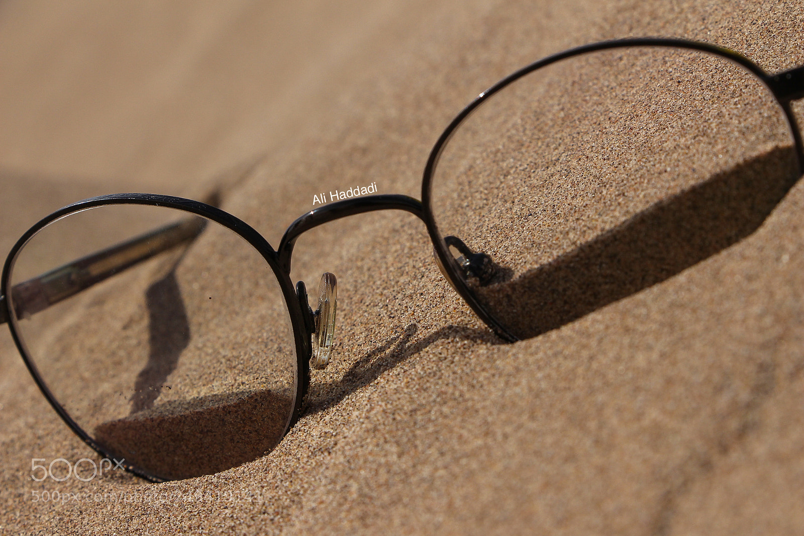 Canon EOS 700D (EOS Rebel T5i / EOS Kiss X7i) sample photo. Glasses in sand photography