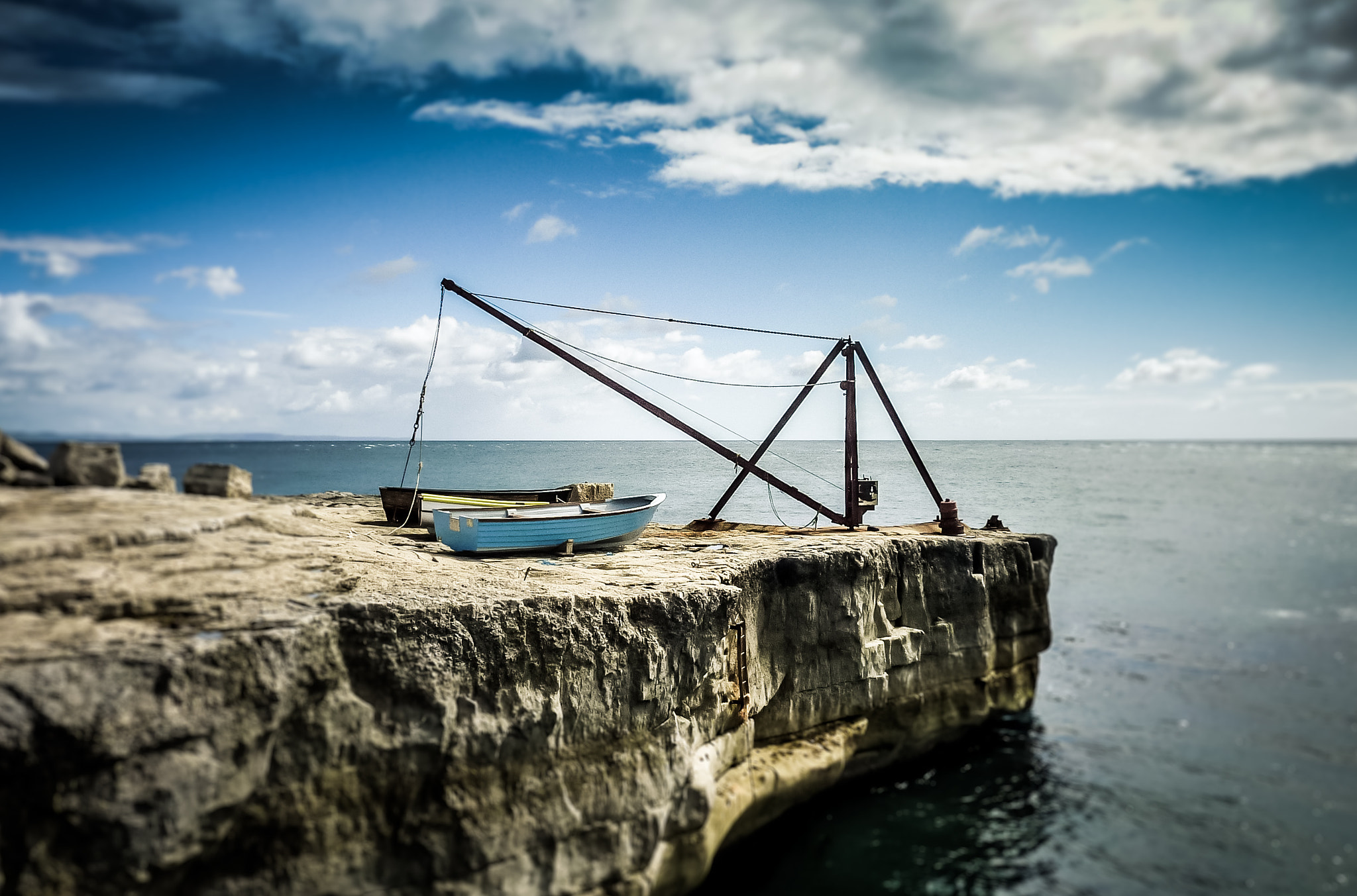 Panasonic DMC-ZS3 sample photo. Boats on a rocky coast photography