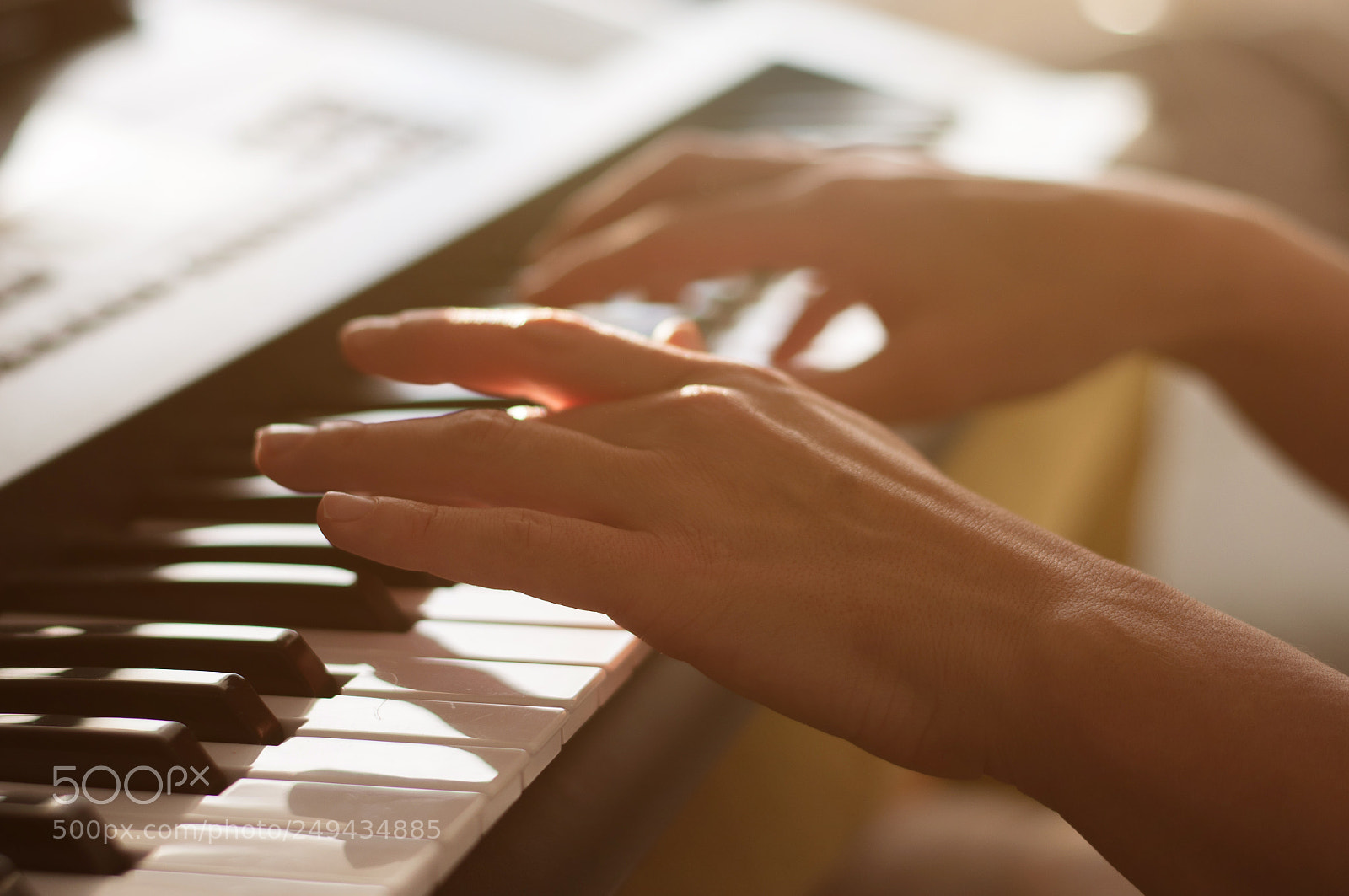 Nikon D5000 sample photo. Hands on piano photography