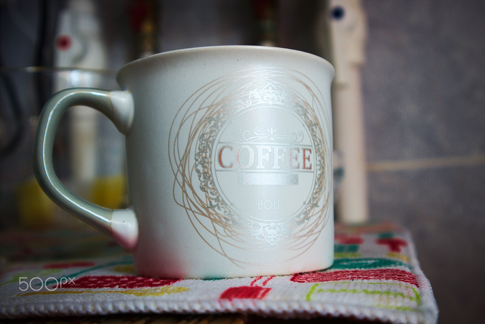 Canon EOS M10 sample photo. Cup of coffee on the kitchen table photography