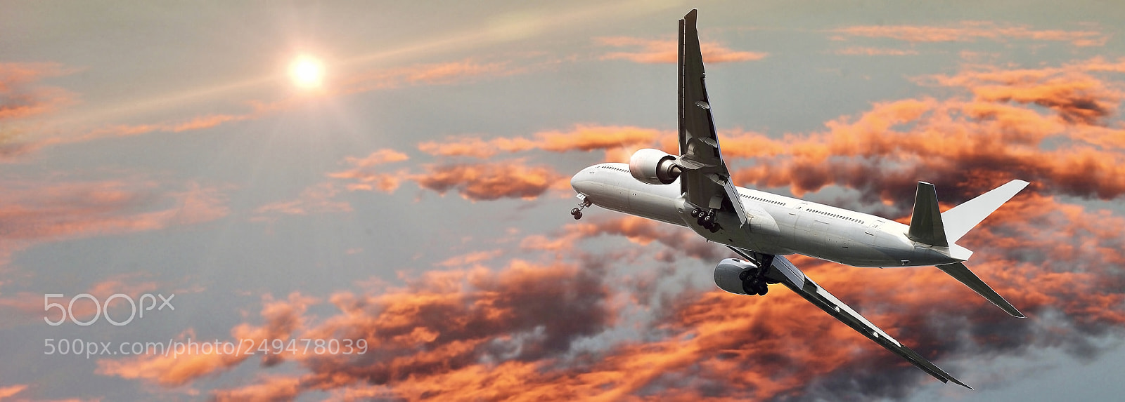 Canon EOS 550D (EOS Rebel T2i / EOS Kiss X4) sample photo. Commercial airplane flying above photography