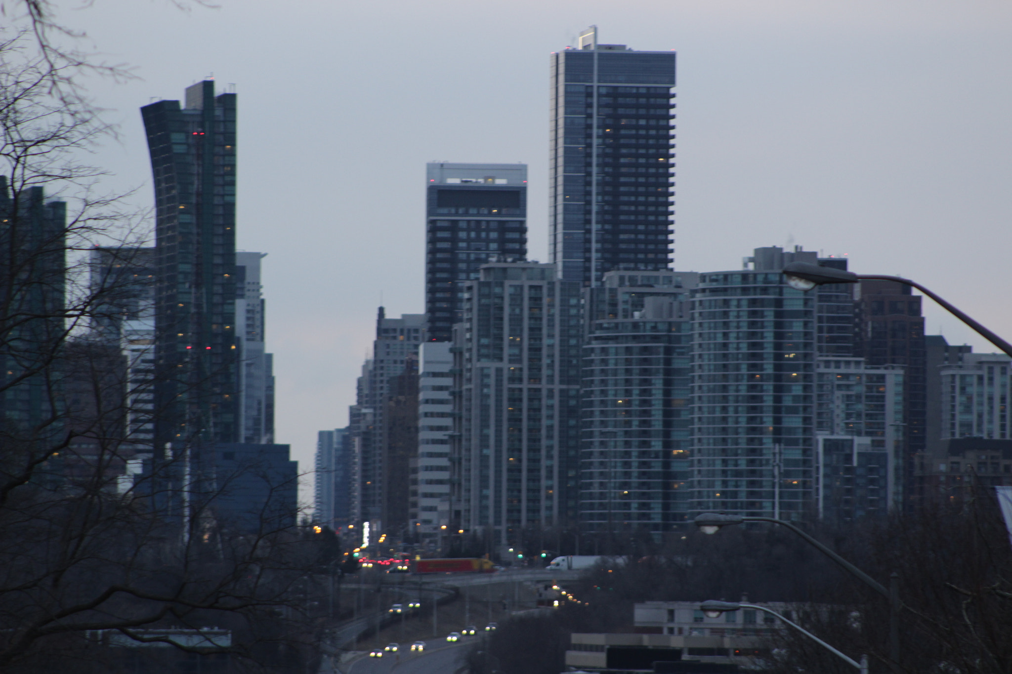 Canon EOS 100D (EOS Rebel SL1 / EOS Kiss X7) + Canon EF 75-300mm f/4-5.6 sample photo. Toronto skyline..yonge street looking north photography