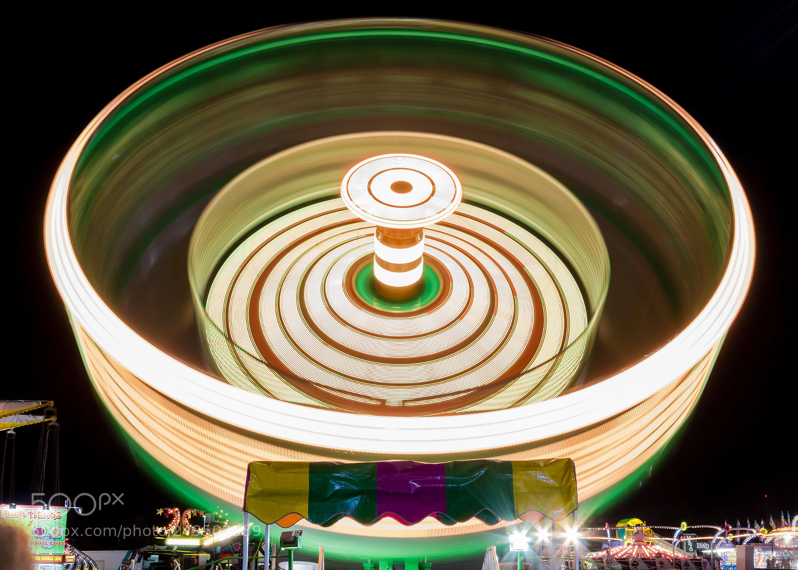Canon EOS 60D sample photo. Spinning ride at fair photography