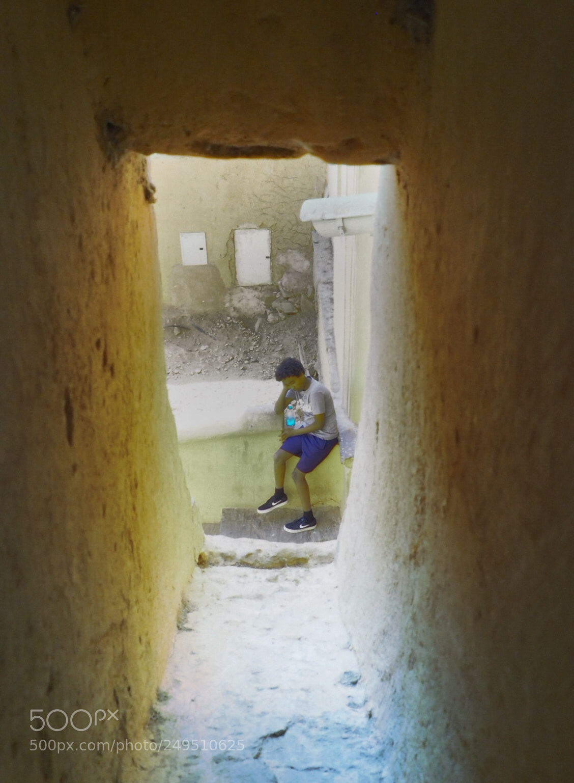 Olympus OM-D E-M10 II sample photo. The boy in window photography