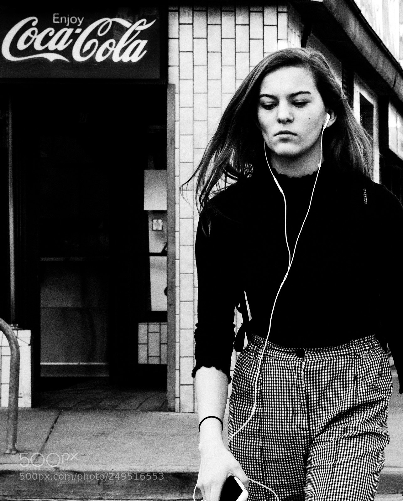 Sony a6500 sample photo. Woman and coke sign photography