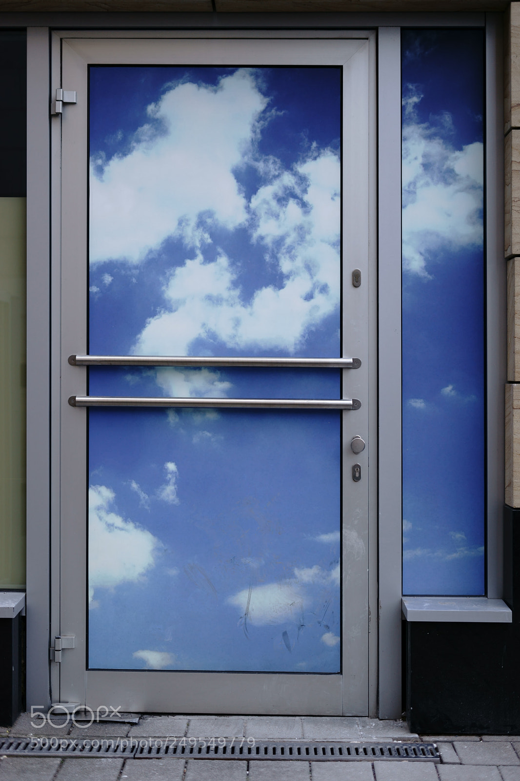 Sony a7 II sample photo. Door with clouds photography