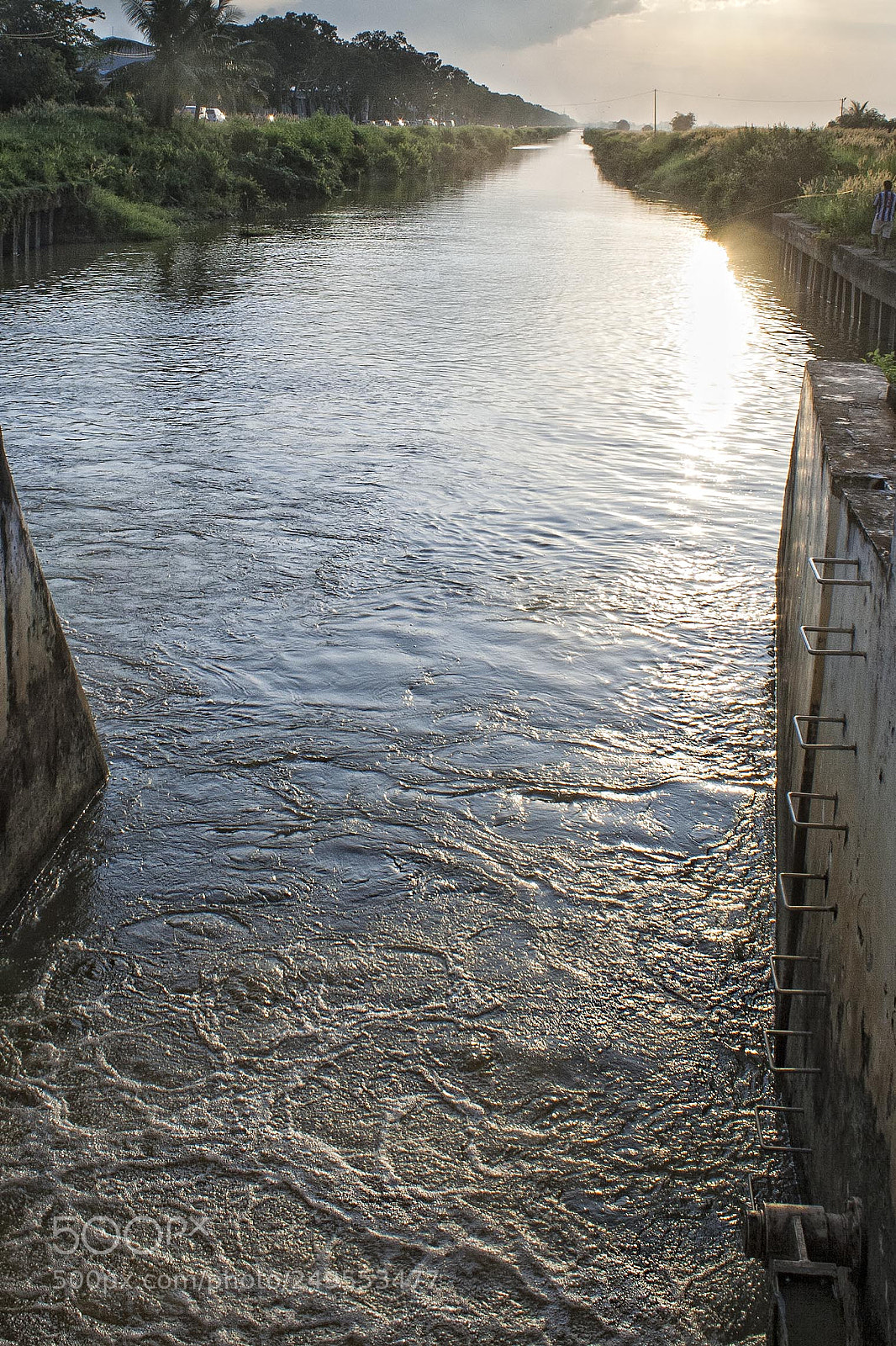 Canon EOS 400D (EOS Digital Rebel XTi / EOS Kiss Digital X) sample photo. Sunset over jitra canal photography