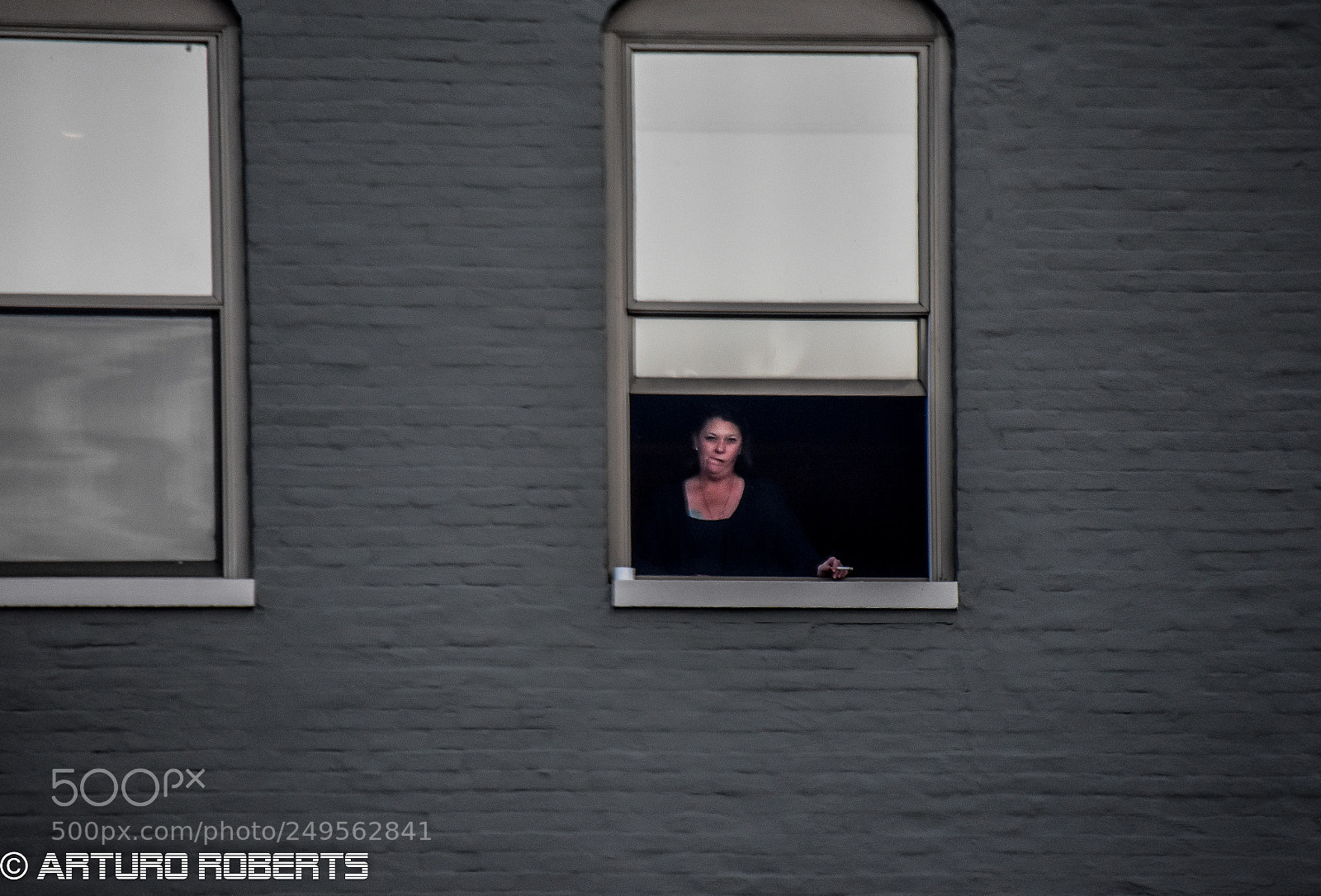 Nikon D5500 sample photo. Woman in window photography