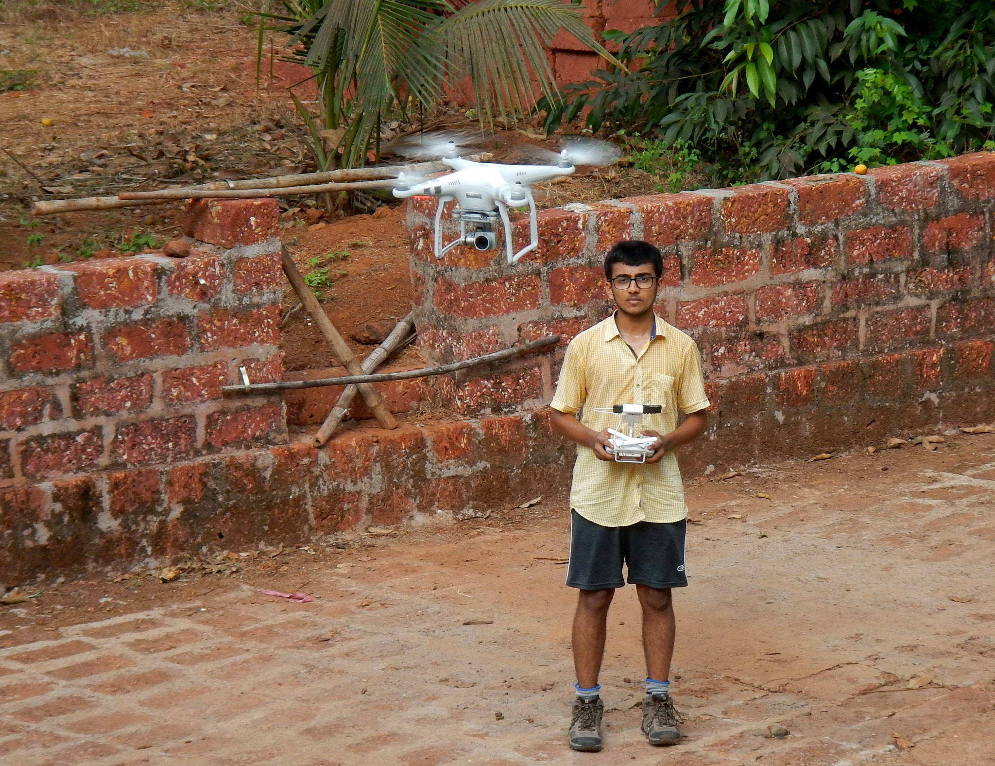 Nikon Coolpix AW110 sample photo. Drone flying in village photography