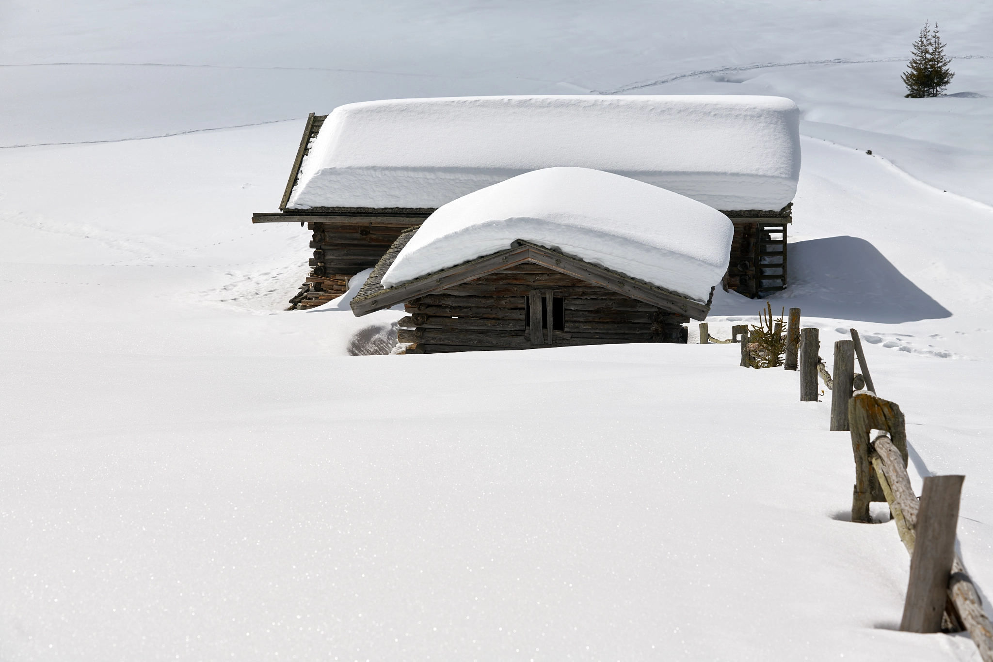 Sony a99 II sample photo. Fence and huts photography