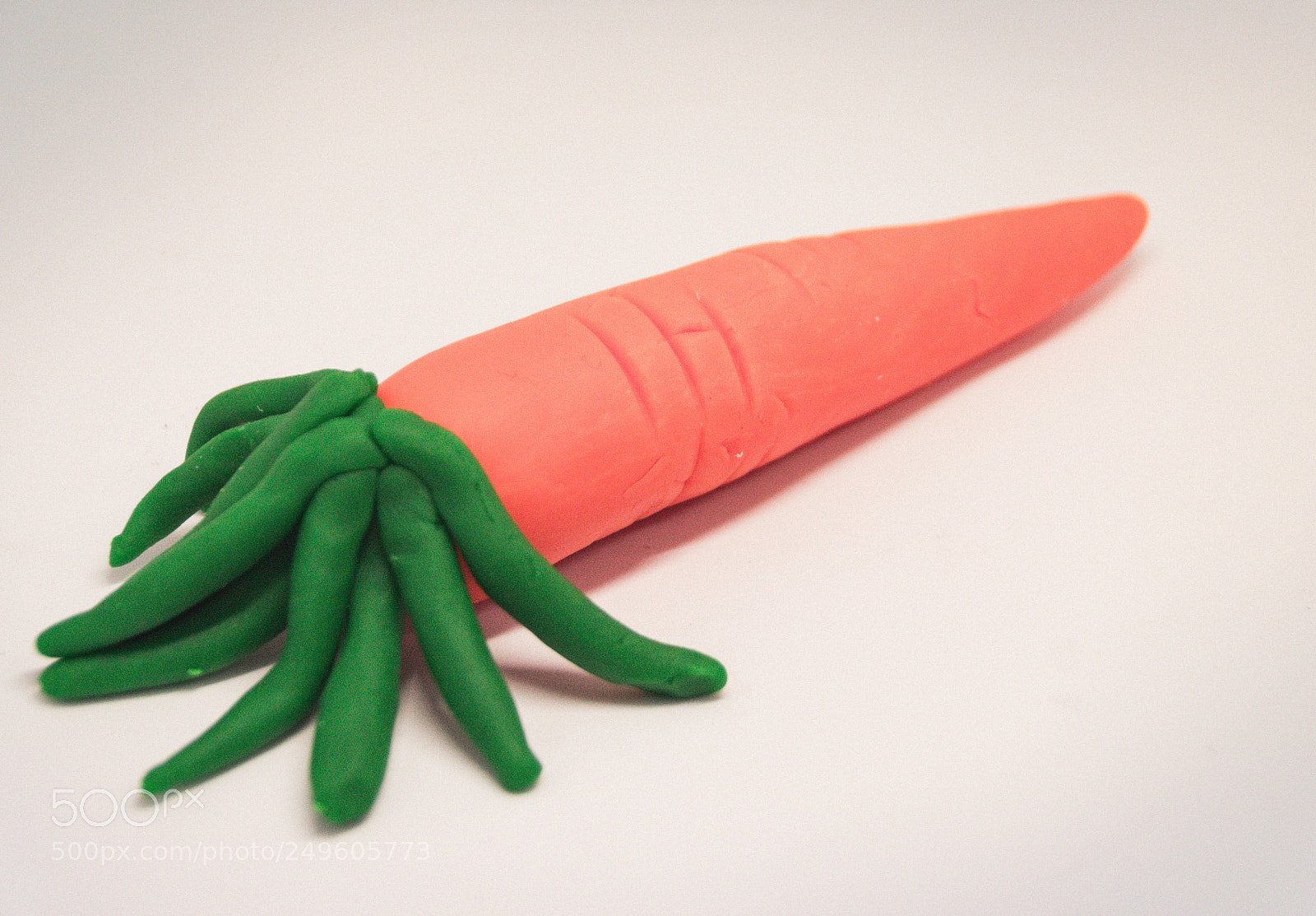 Canon EOS 1200D (EOS Rebel T5 / EOS Kiss X70 / EOS Hi) sample photo. Plasticine carrot photograph photography