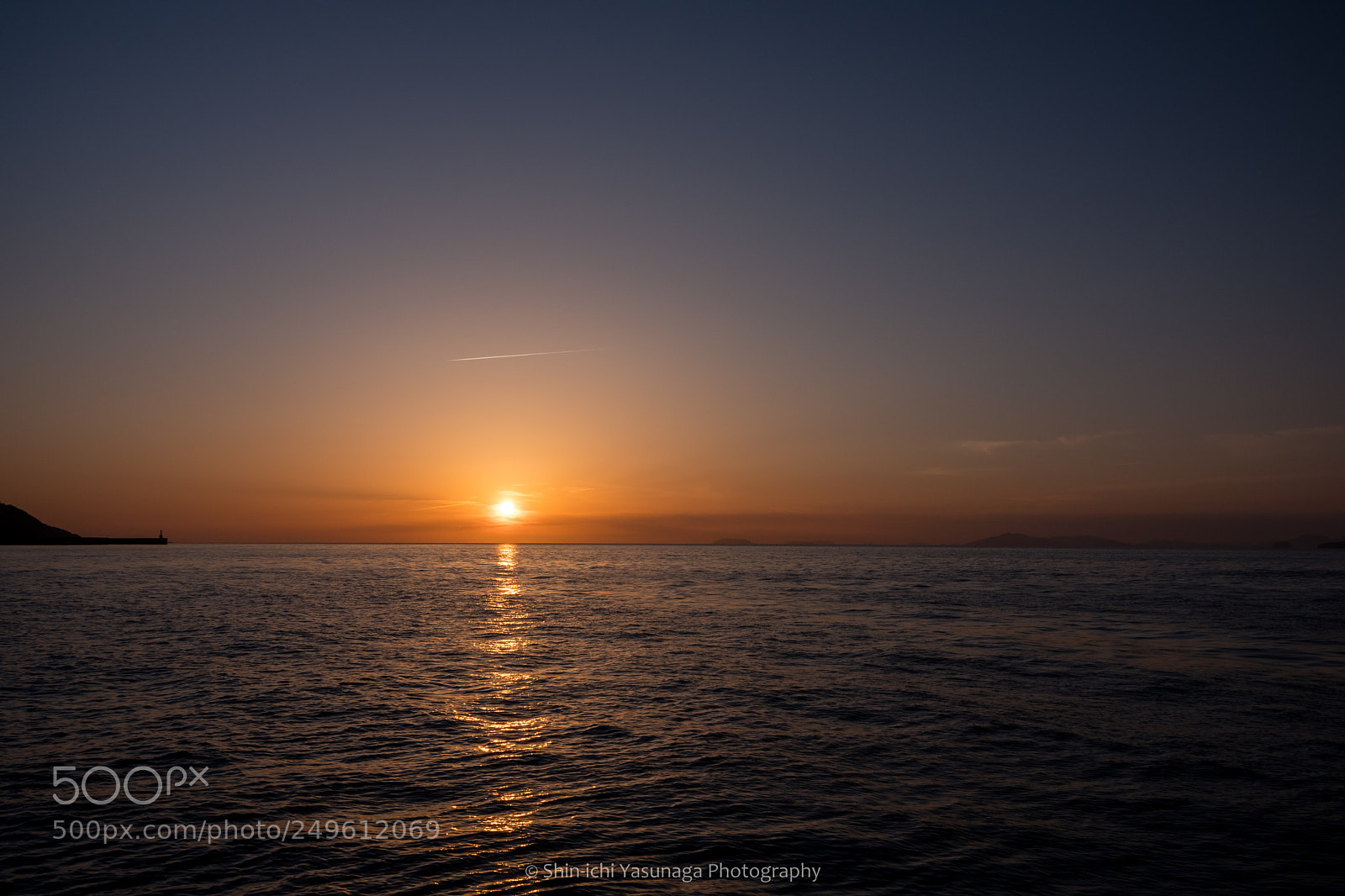 Pentax K-70 sample photo. Sunset & contrail photography