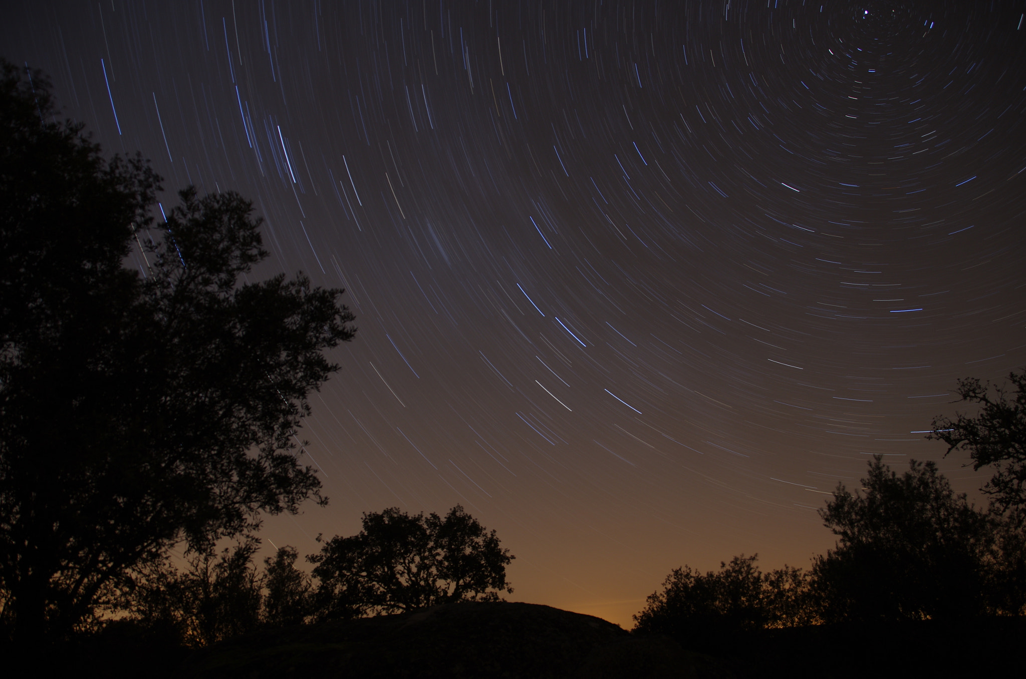 Pentax K-5 + Pentax smc DA 18-270mm F3.5-6.3 ED SDM sample photo. Stars moving around the north star photography