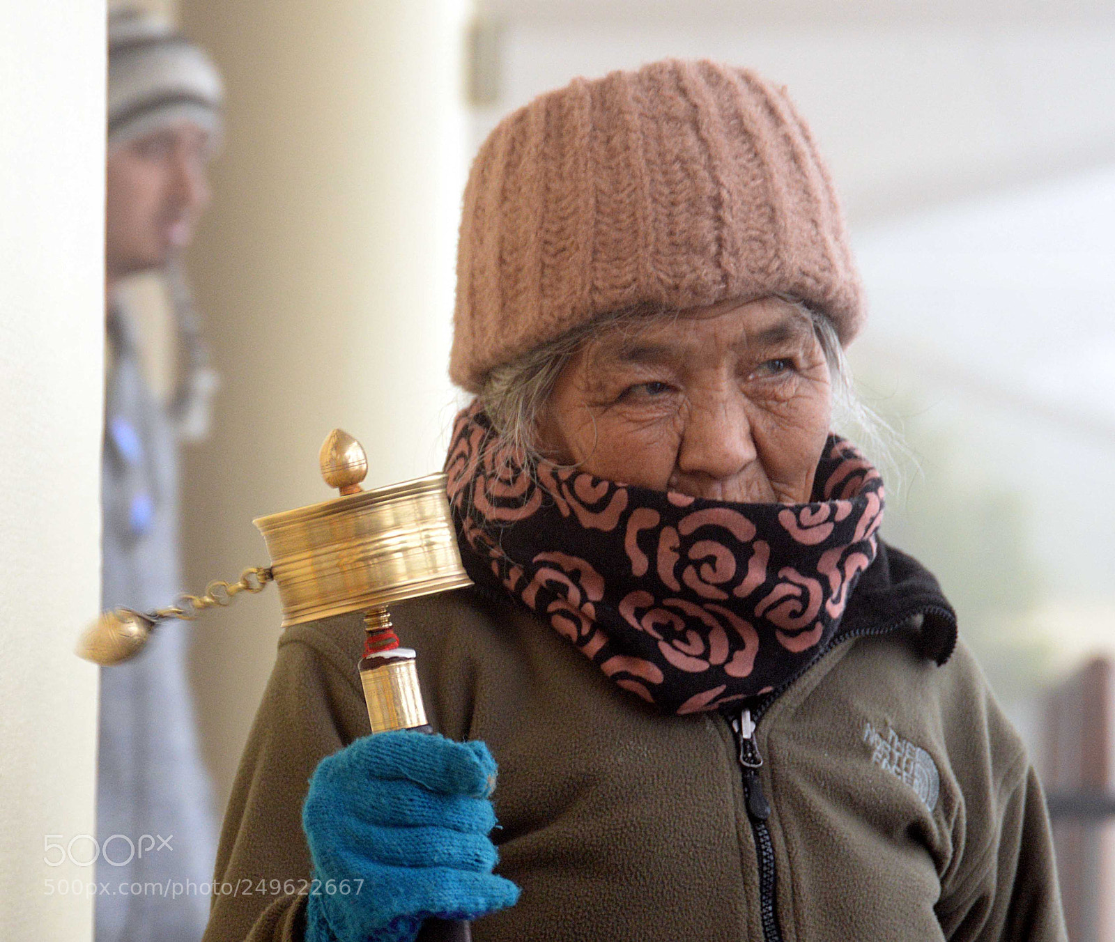 Nikon D610 sample photo. Old tibetan woman spinning photography