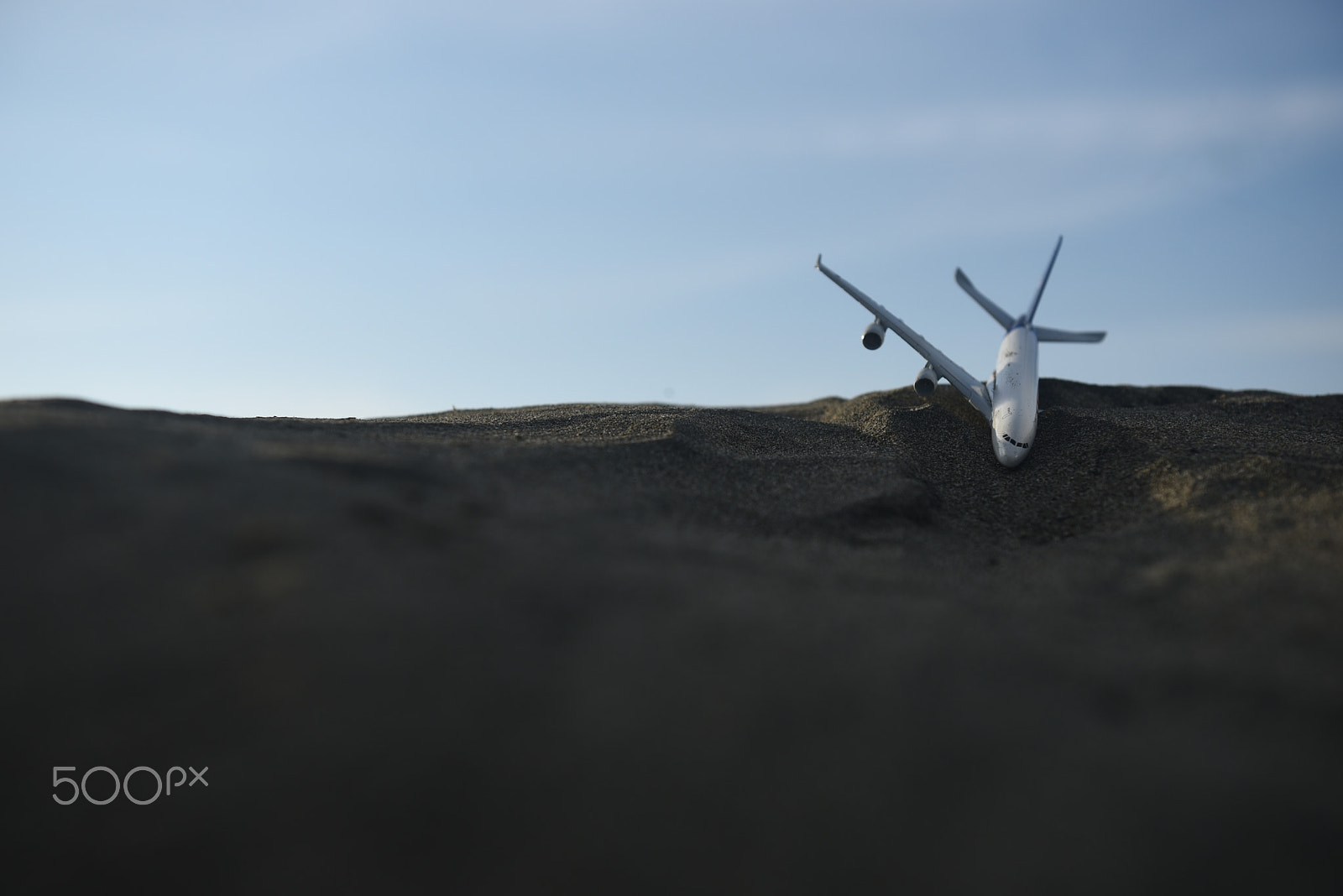Nikon AF-S Nikkor 24-70mm F2.8G ED sample photo. Cargo airplane doing emergency landing on the dese photography