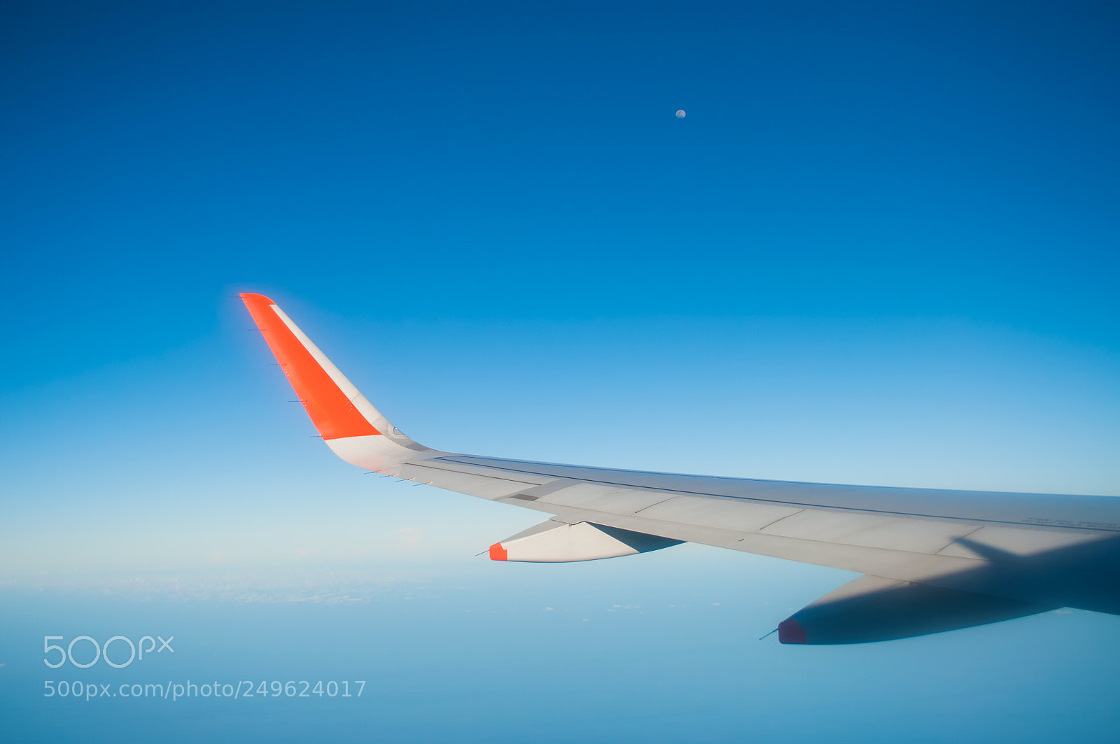 Nikon D90 sample photo. Airplane wing blue sky photography