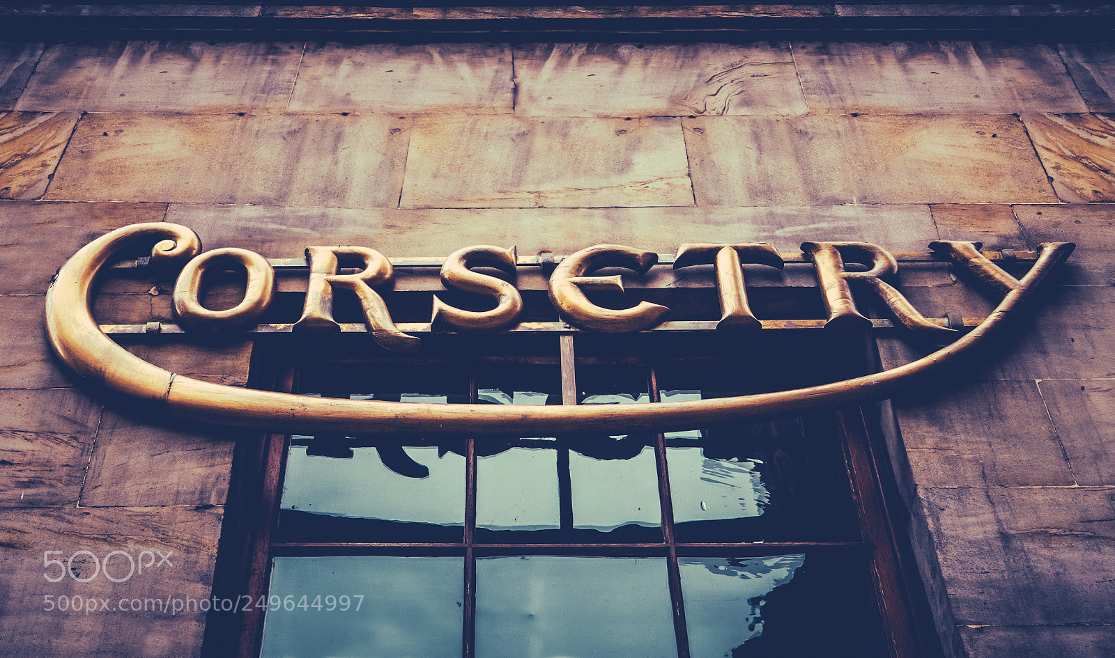 Panasonic Lumix DMC-LX100 sample photo. Vintage corsetry store sign photography