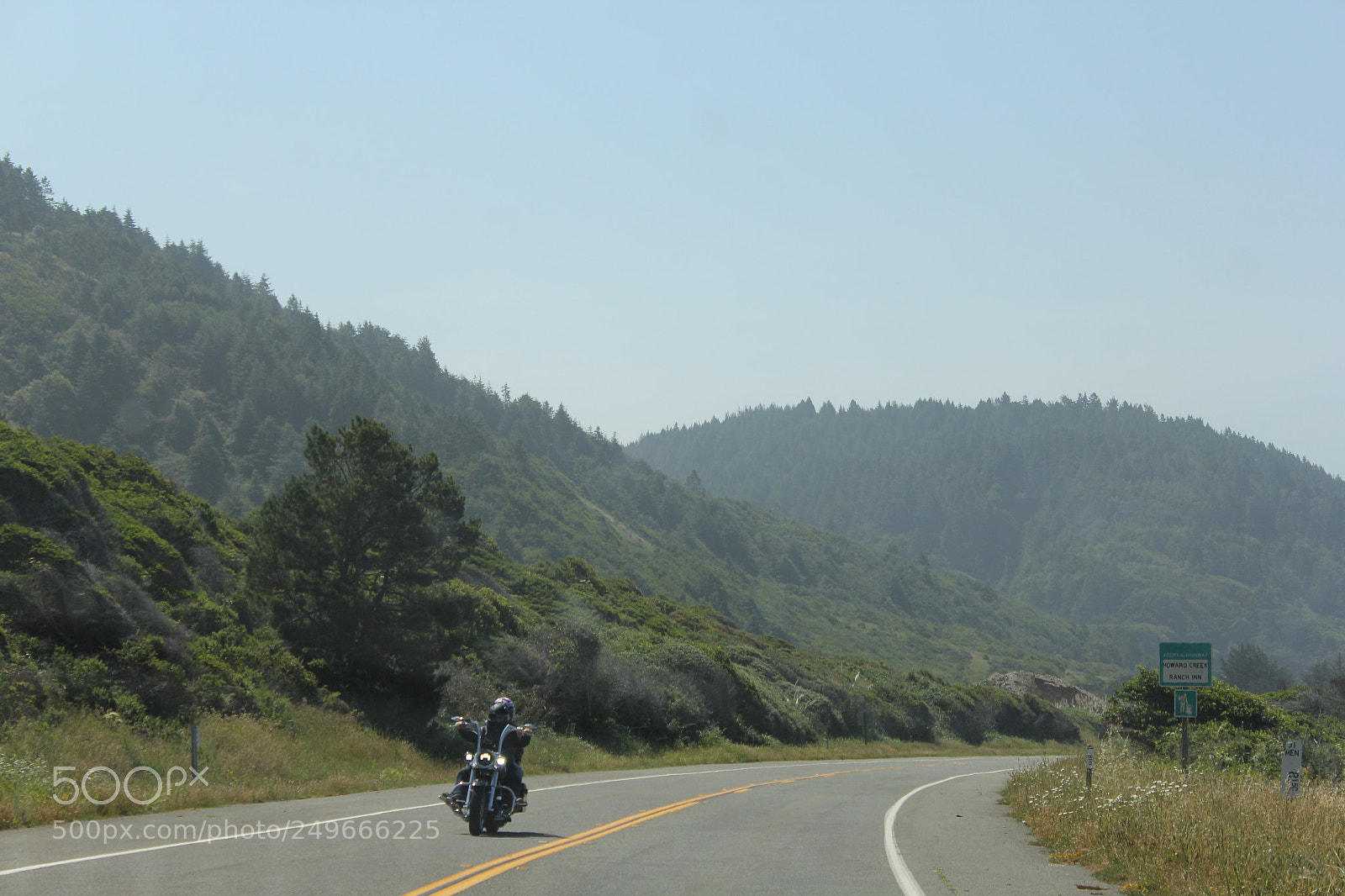 Canon EOS 60D sample photo. Motorcycle amongst the hills photography