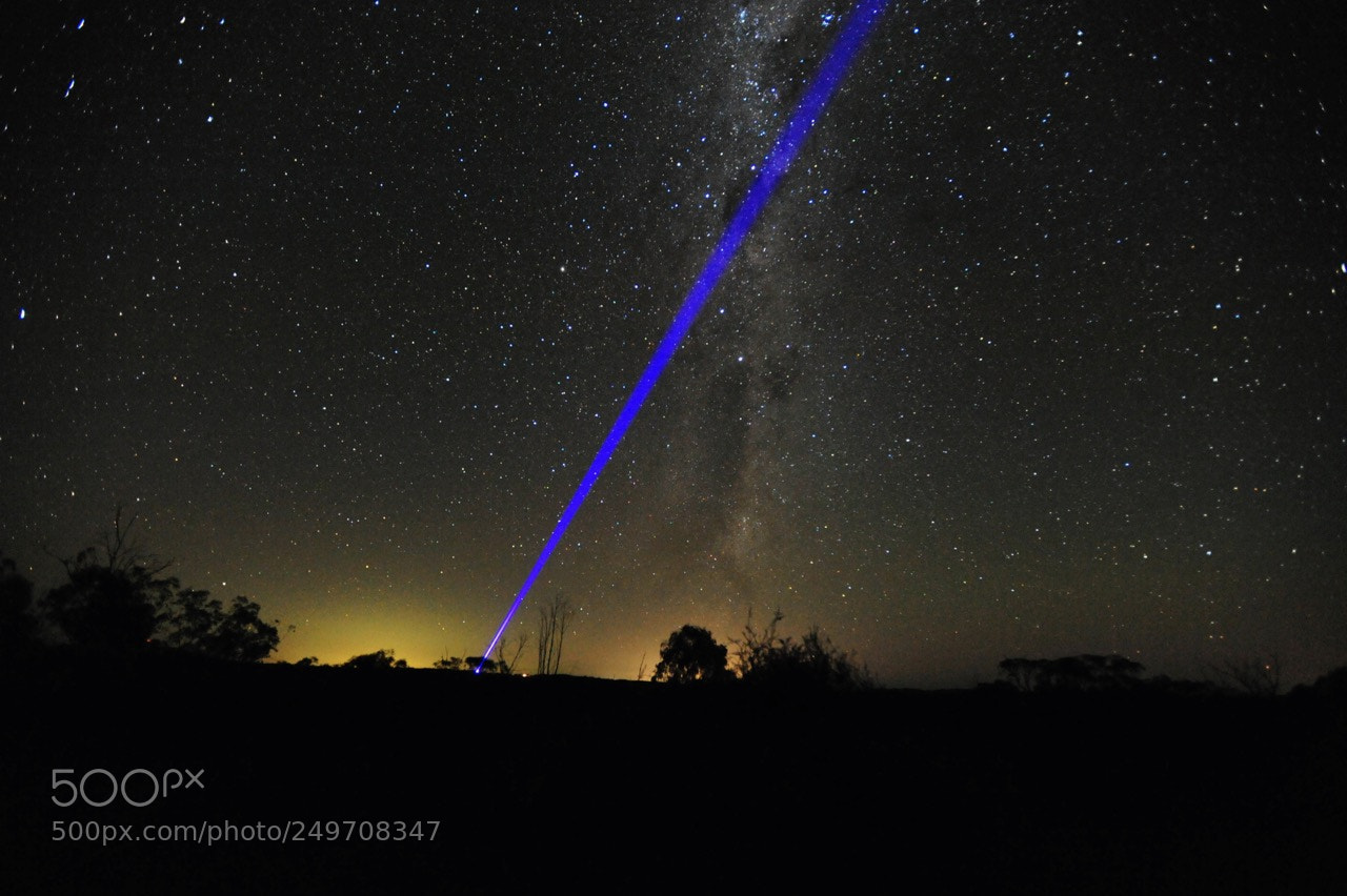 Nikon D700 sample photo. Blue laser from mountain. photography