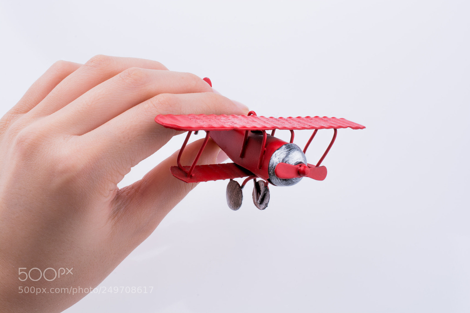 Nikon D7100 sample photo. Hand holding a toy photography