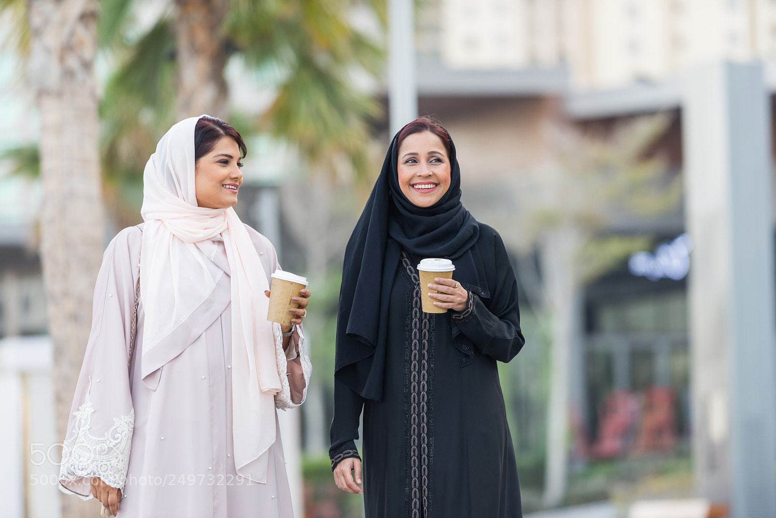 Nikon D610 sample photo. Two arabian girlfriends bonding photography