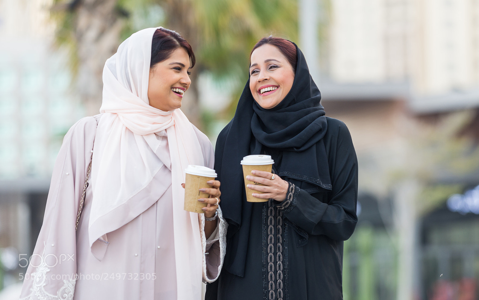 Nikon D610 sample photo. Two arabian girlfriends bonding photography