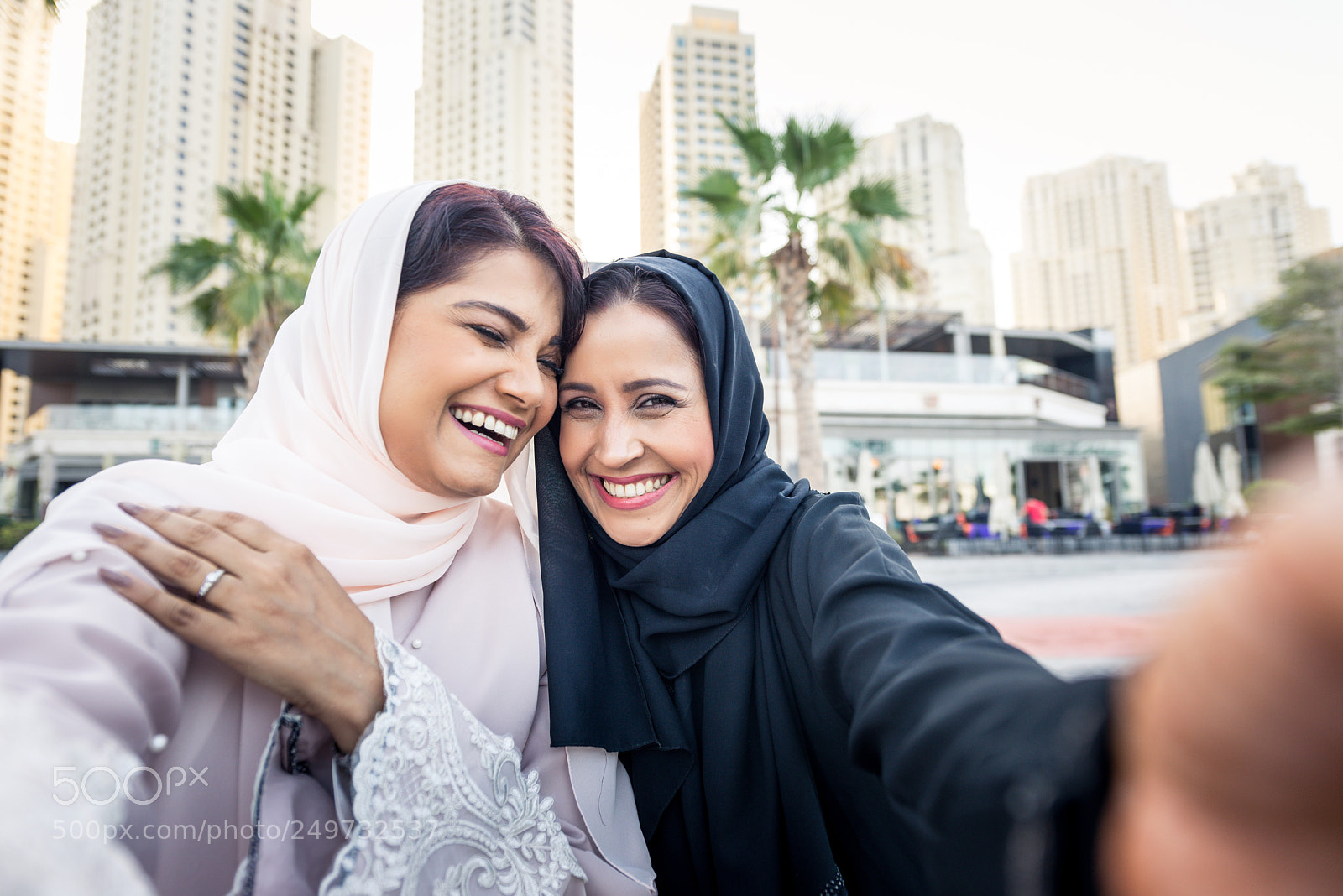 Nikon D610 sample photo. Two arabian girlfriends bonding photography