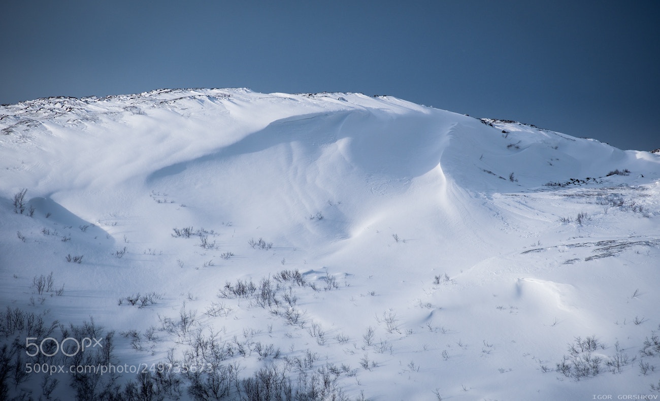 Fujifilm X-T20 sample photo. Snowy mountains and clouds photography