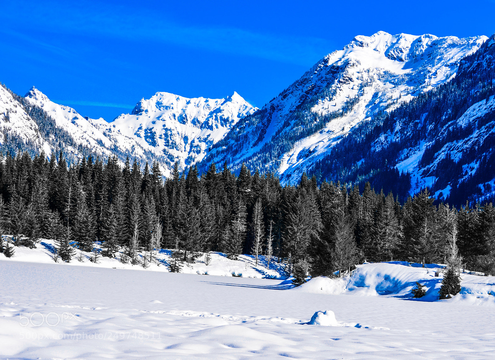 Nikon D5100 sample photo. Frozen lake, snow capped photography