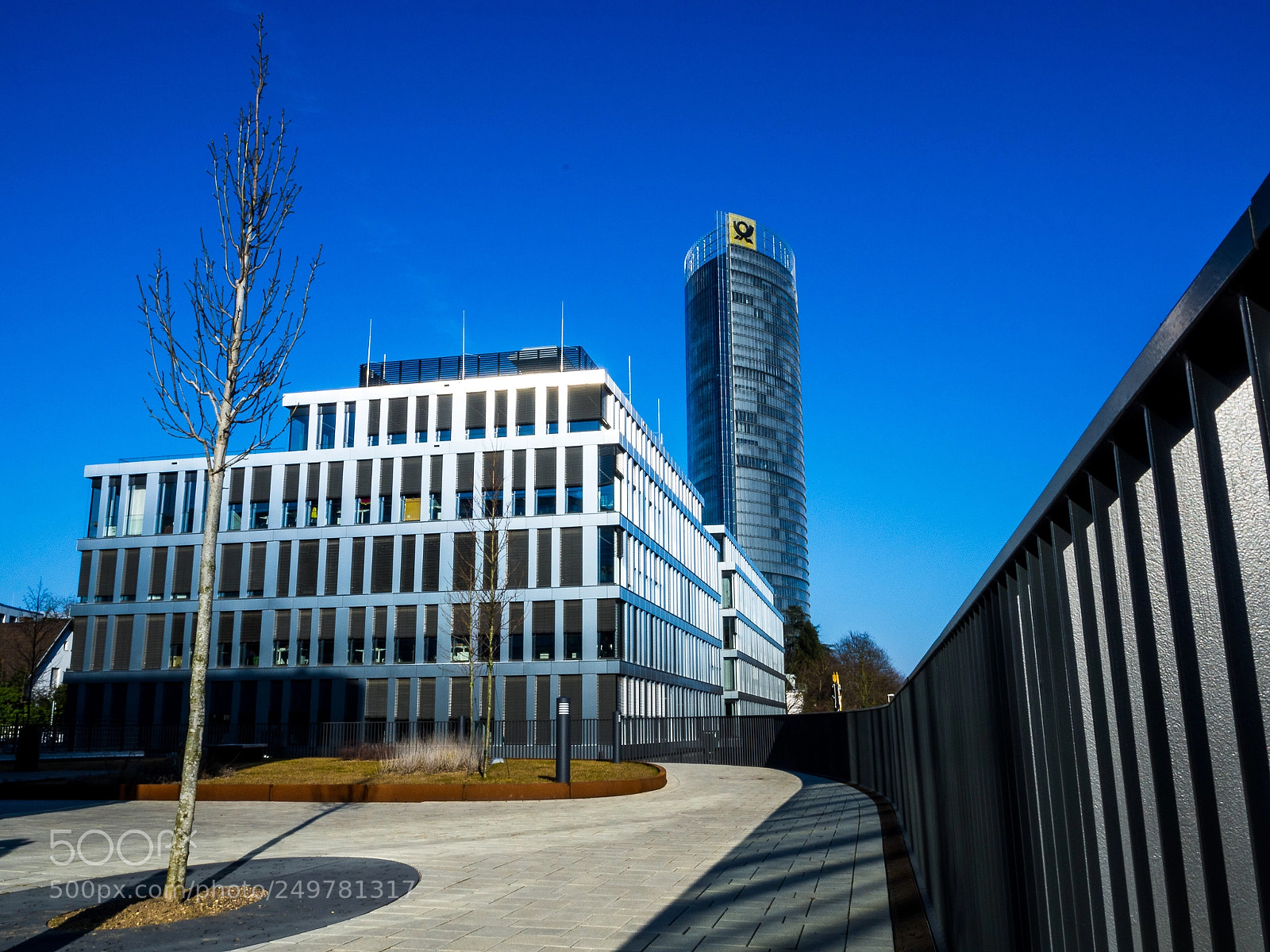 Olympus OM-D E-M10 sample photo. Shiny office building and photography