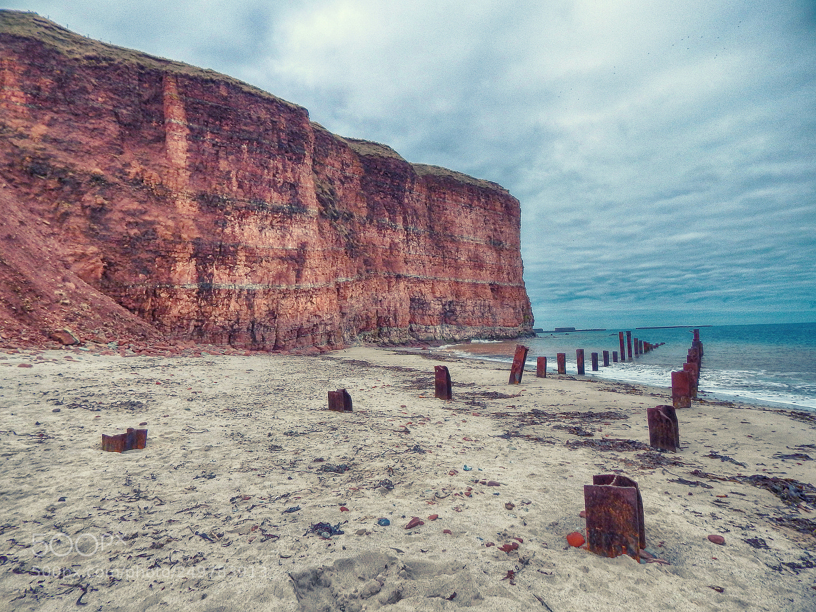 Nikon Coolpix L830 sample photo. Beach and red cliffs photography