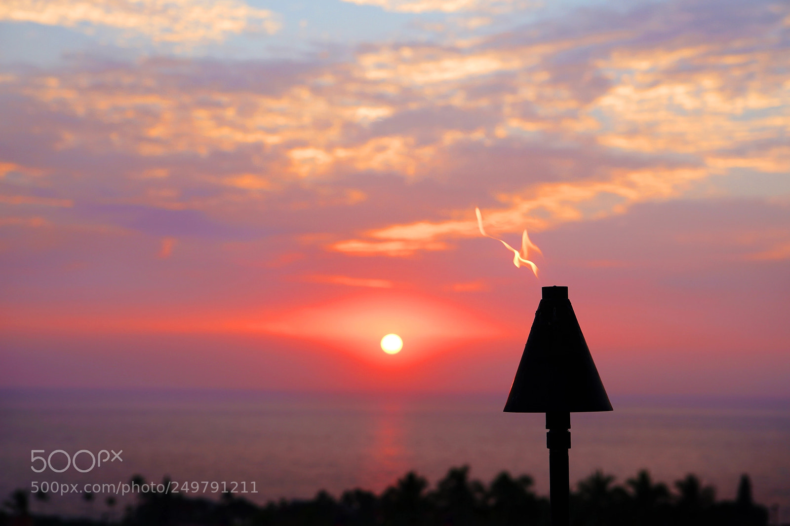Sony a99 II sample photo. Sunset tiki torch photography