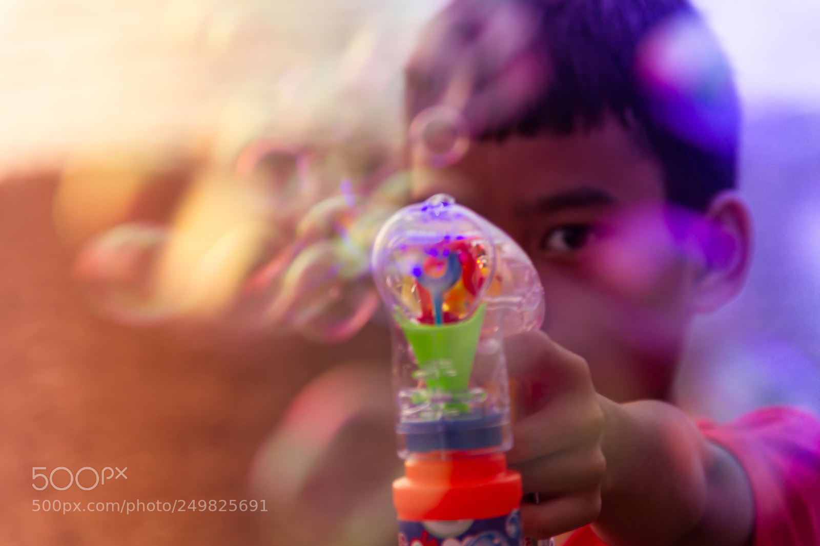 Canon EOS 7D sample photo. A kid playing bubbles  photography