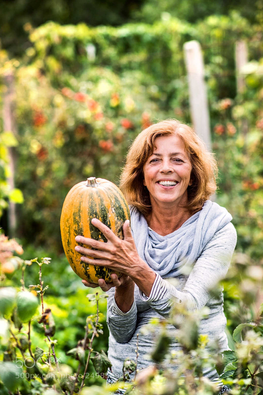 Nikon D5 sample photo. Senior woman gardening in photography