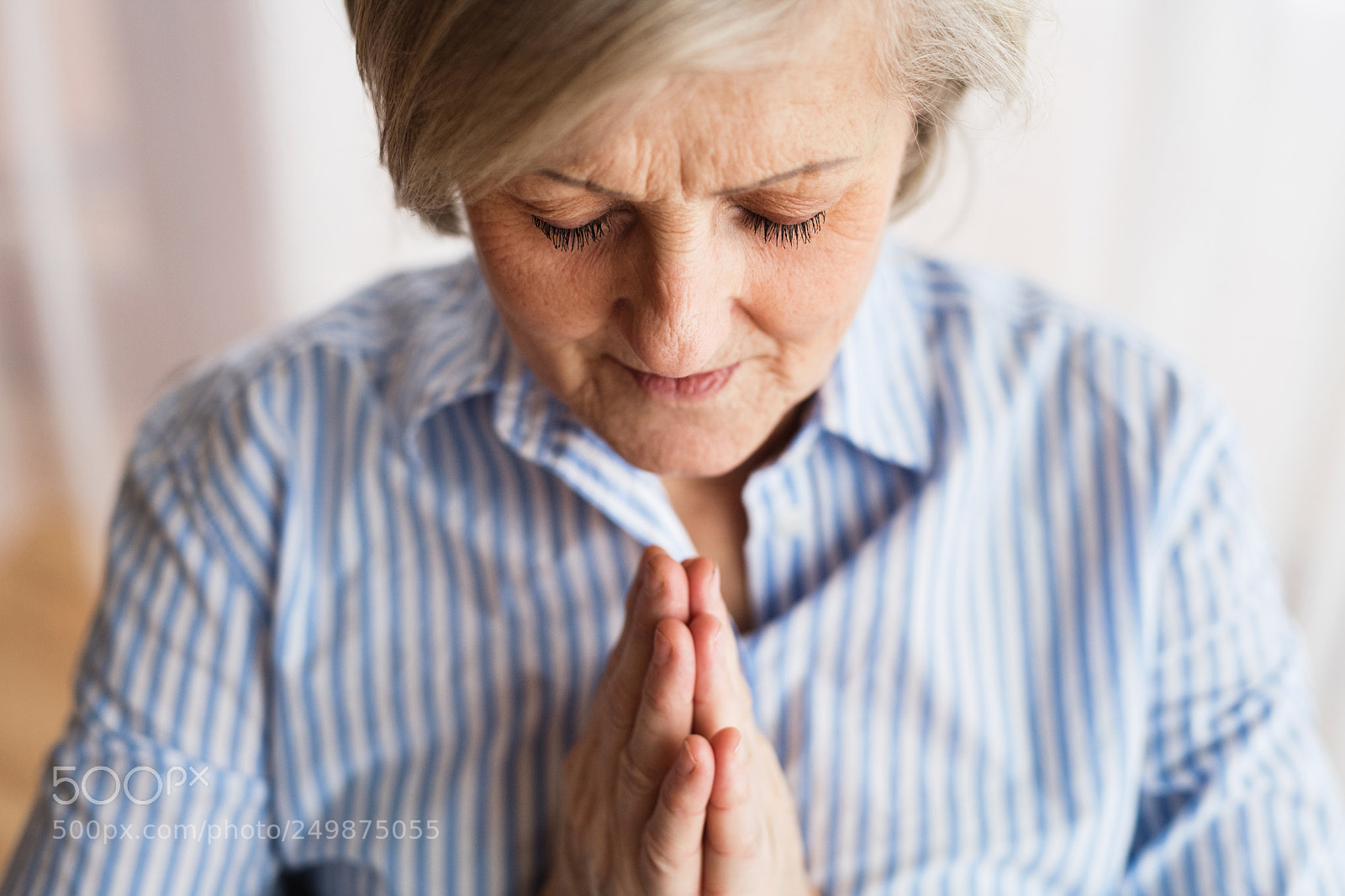Nikon D5 sample photo. A senior woman praying photography