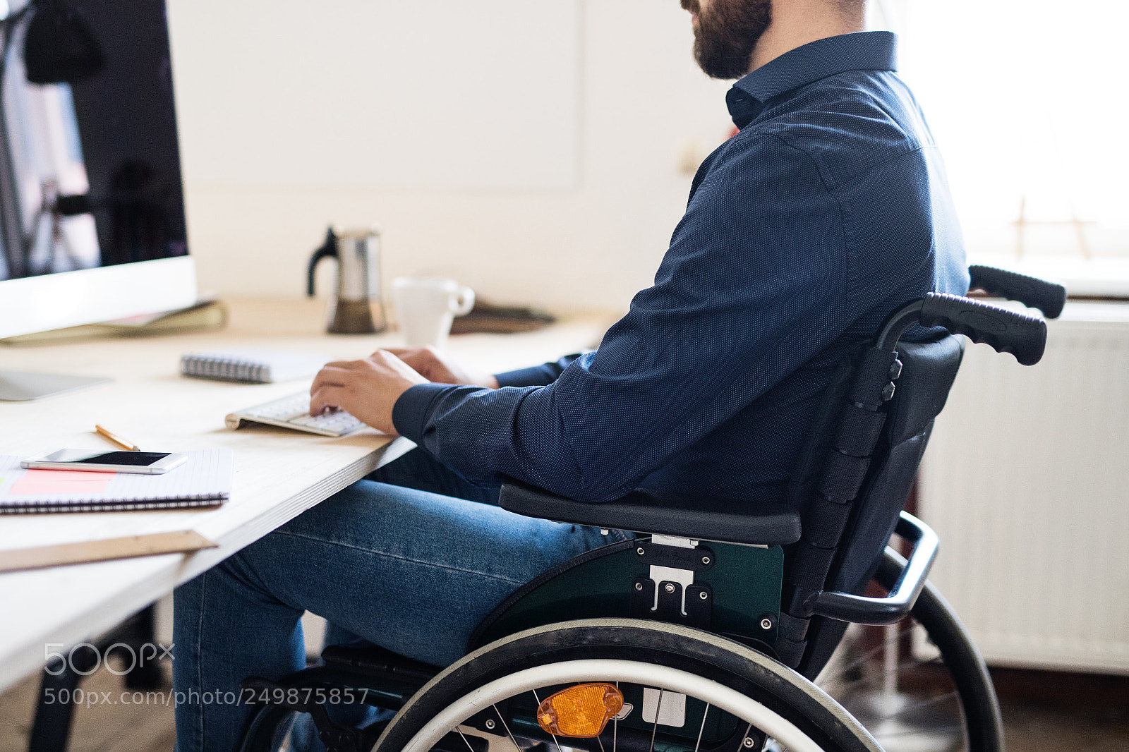 Nikon D5 sample photo. Businessman in wheelchair working photography
