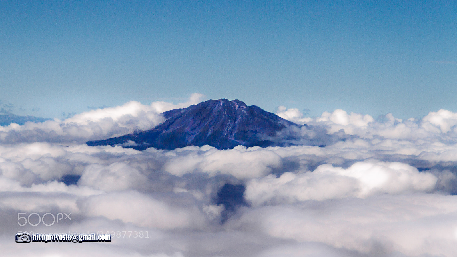 Canon EOS 7D sample photo. Escapando sobre las nubes photography