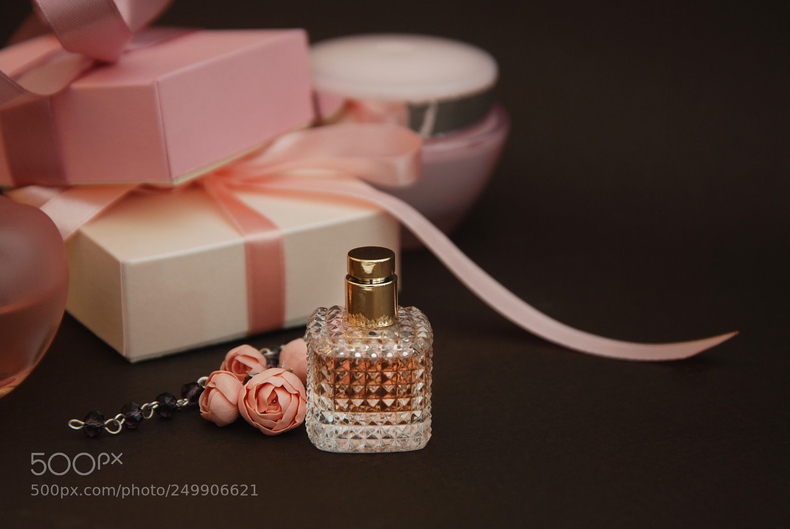 Nikon D80 sample photo. Women's pink perfume in photography
