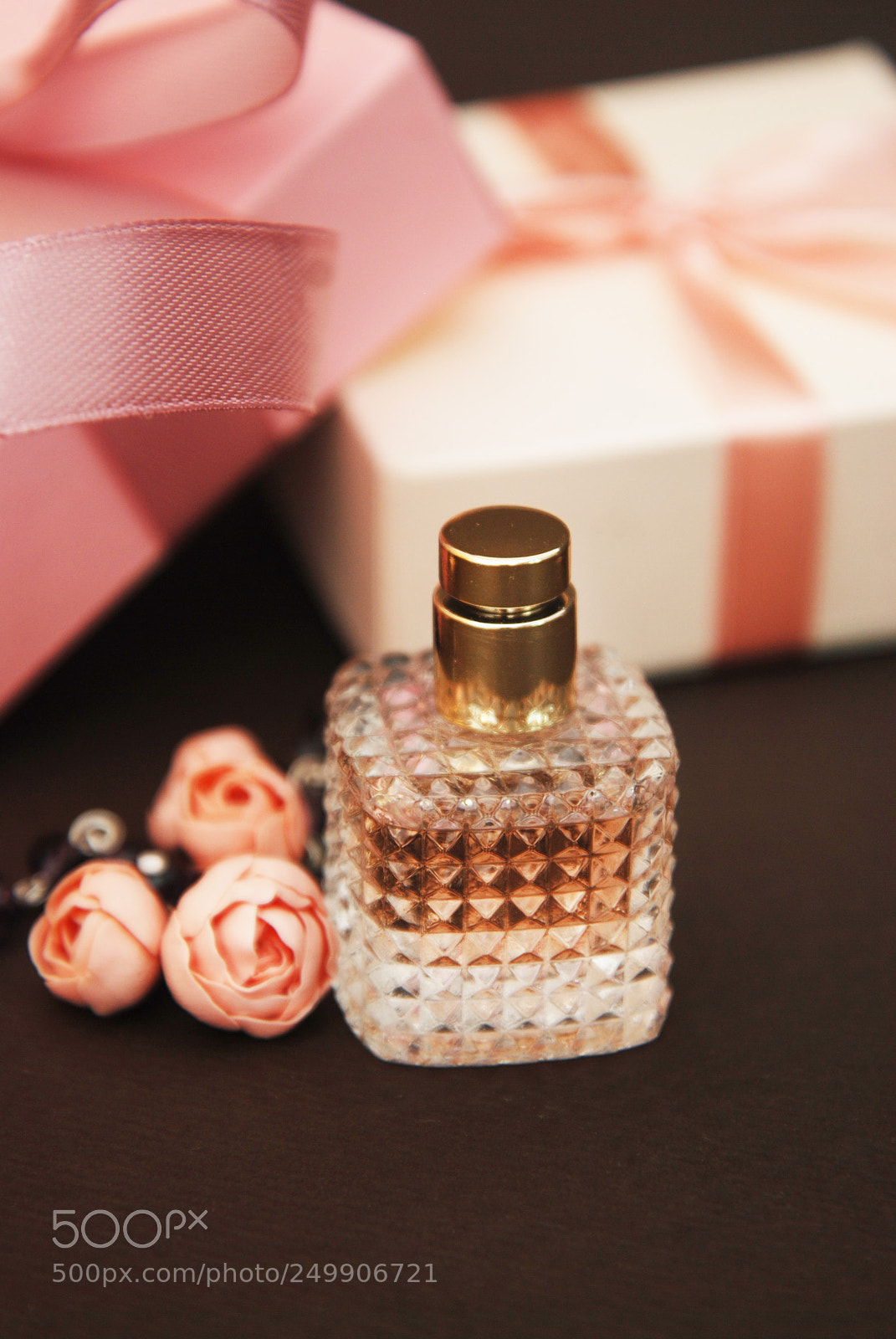 Nikon D80 sample photo. Women's pink perfume in photography