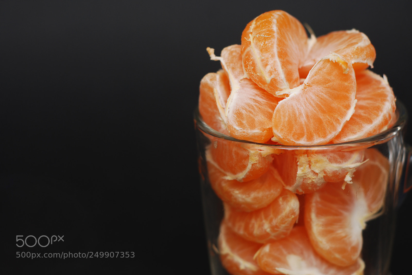 Nikon D80 sample photo. Tangerines slices in glass photography