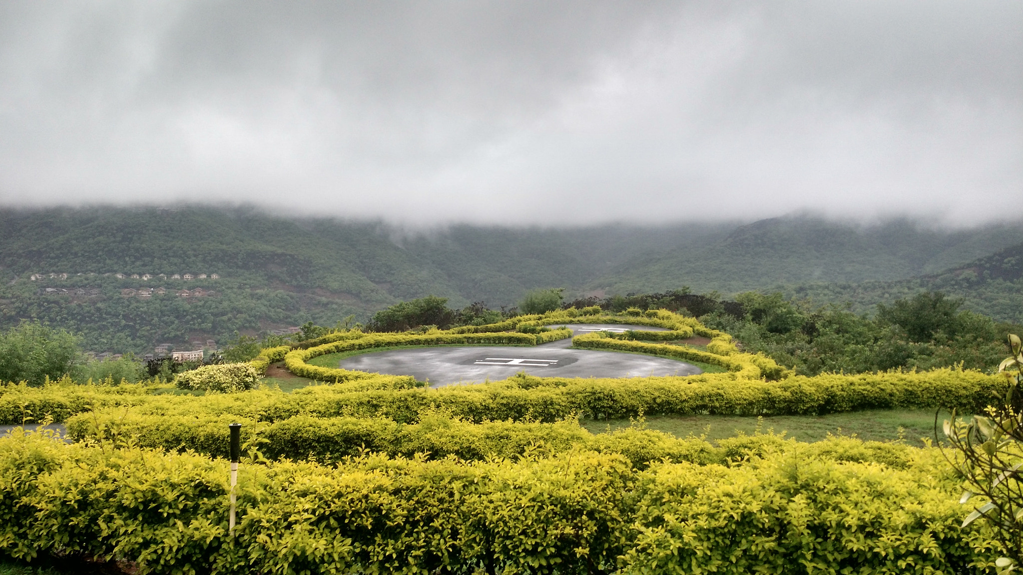 Motorola Moto X (2nd Gen) sample photo. Helipad in lush greenery photography