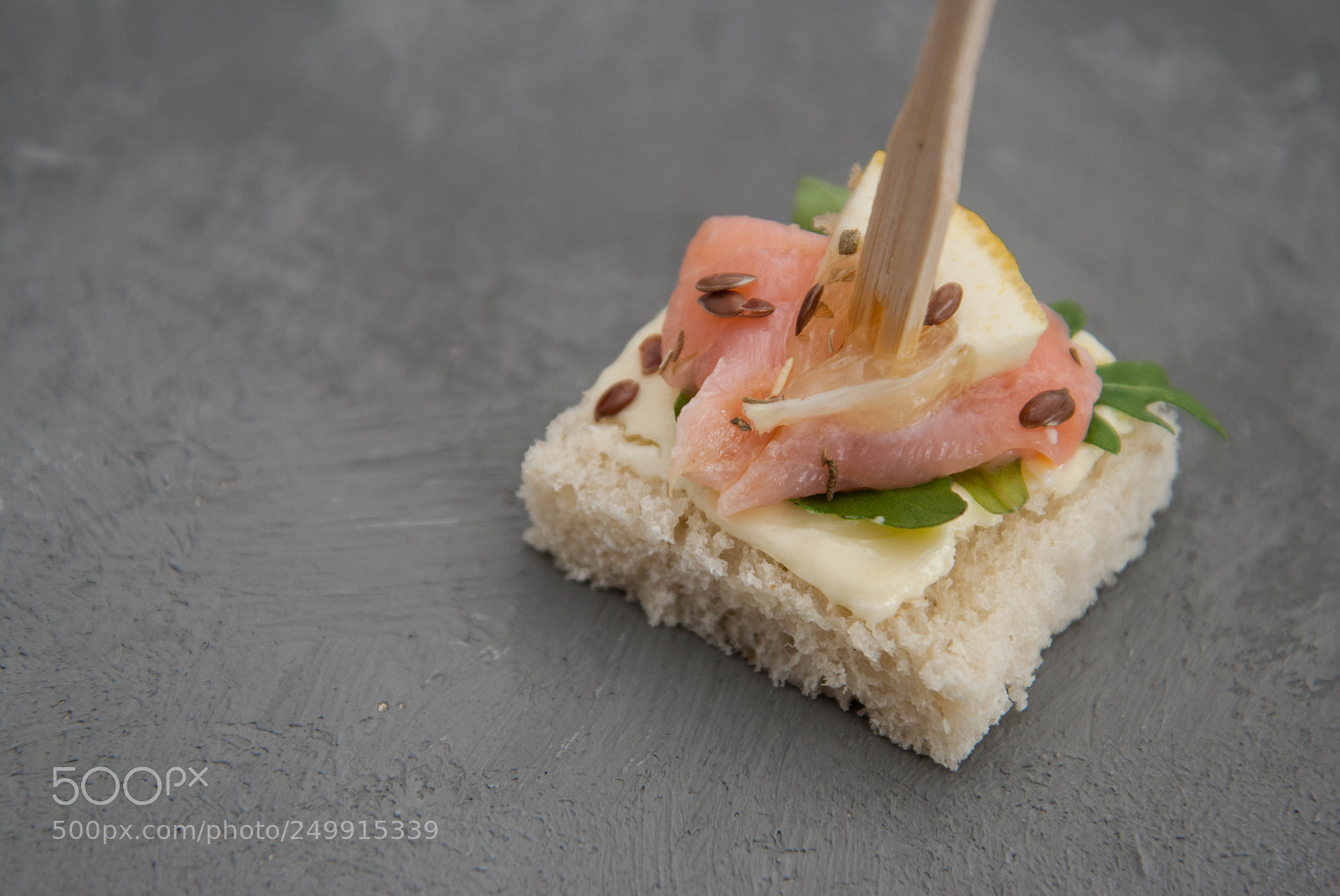 Nikon D80 sample photo. Salmon canape with arugula photography