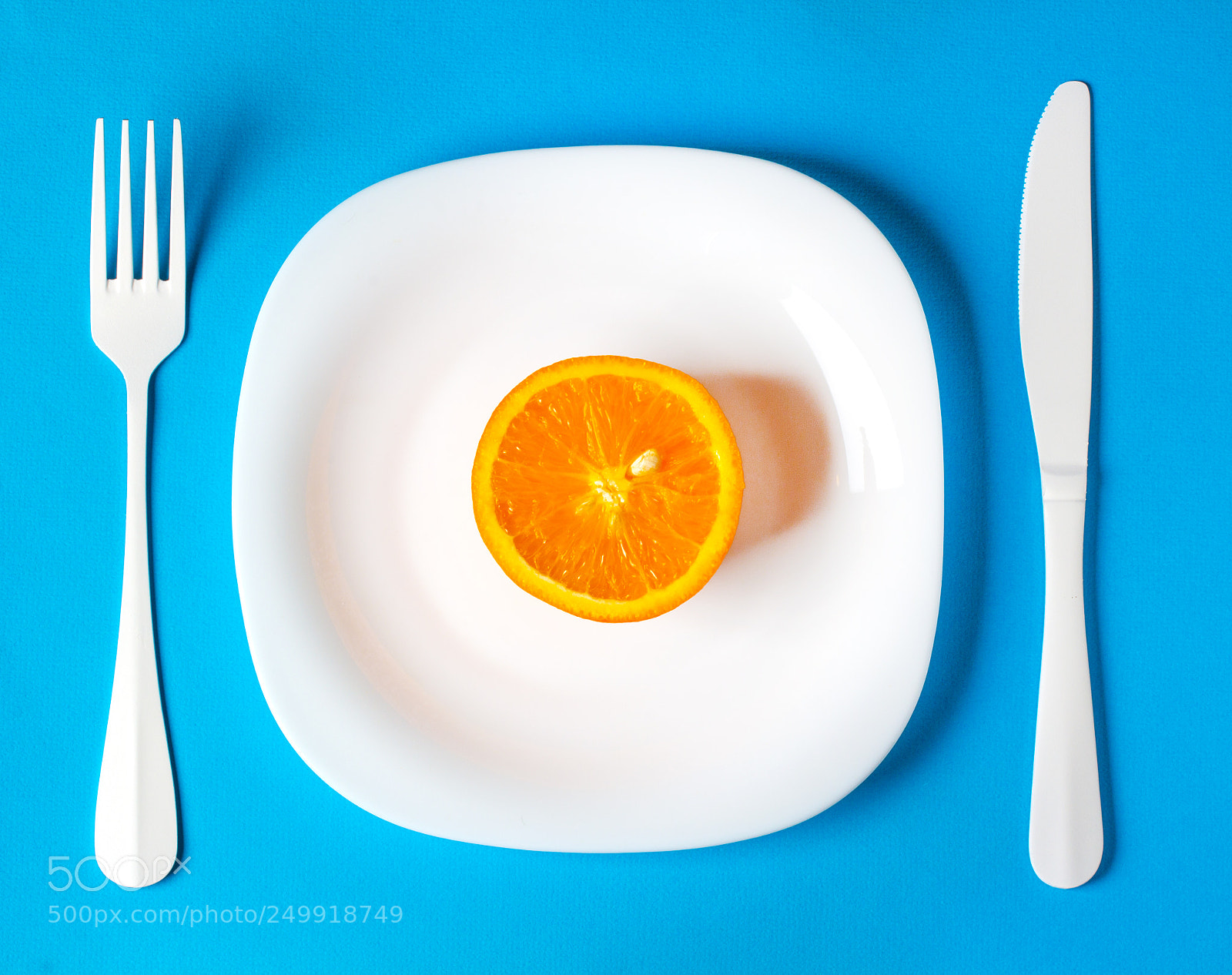 Canon EOS 60D sample photo. Orange fruit in plate photography