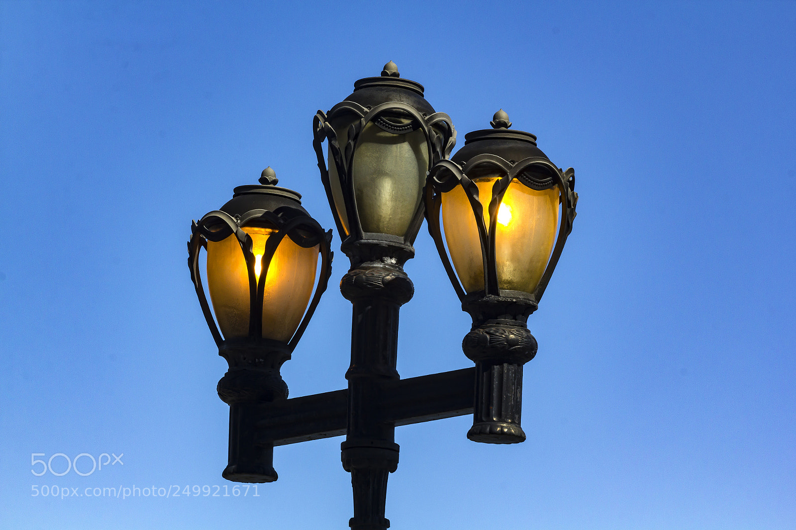 Canon EOS 60D sample photo. Street lamps - daytime photography