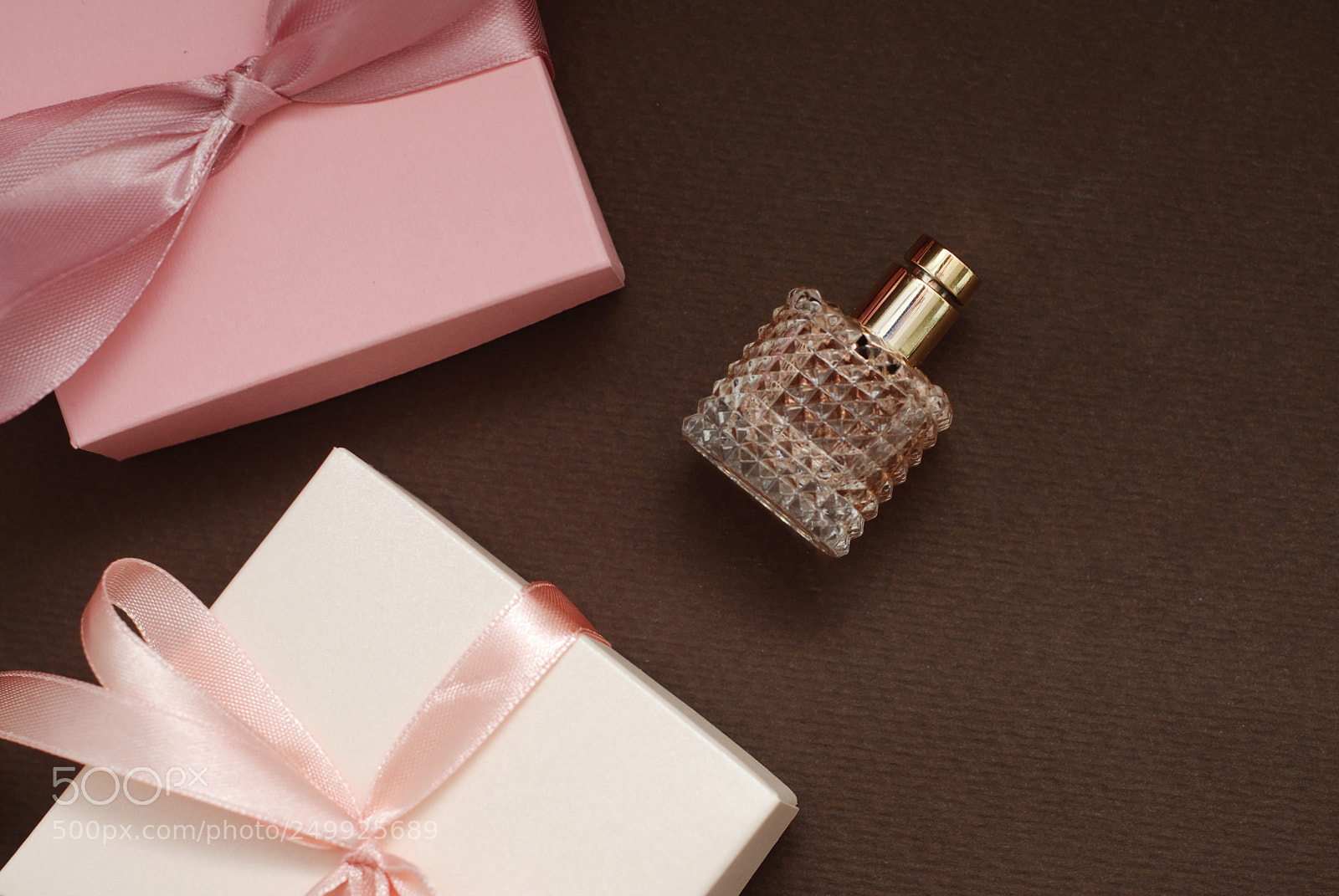 Nikon D80 sample photo. Women's pink perfume in photography