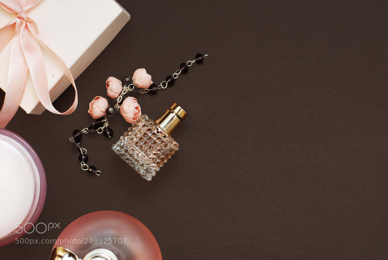 Nikon D80 sample photo. Women's pink perfume in photography