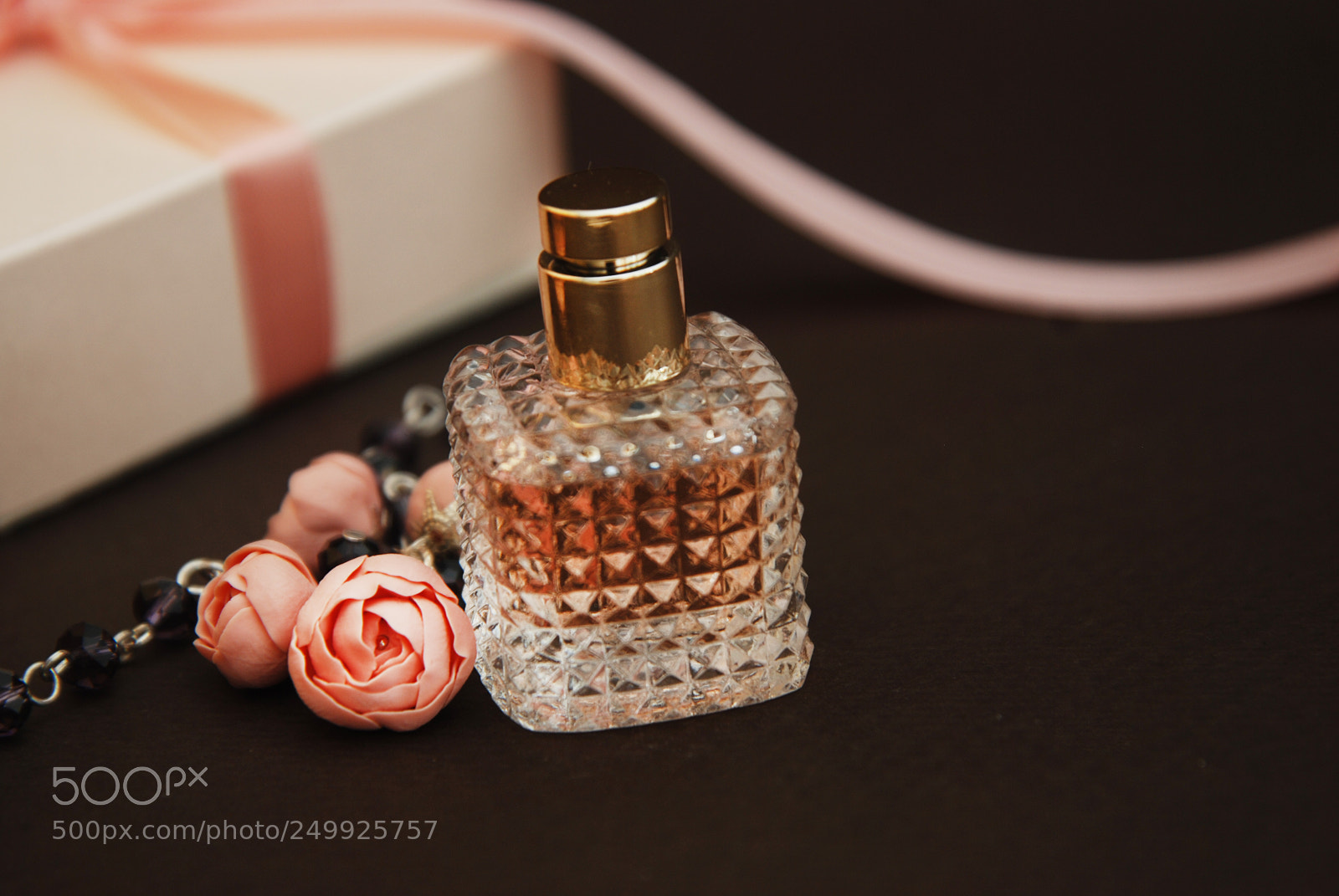 Nikon D80 sample photo. Women's pink perfume in photography